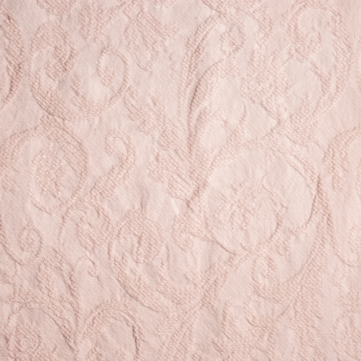Pearl: A close up of Adele fabric in pearl, a nude-like, soft rose pink tone.