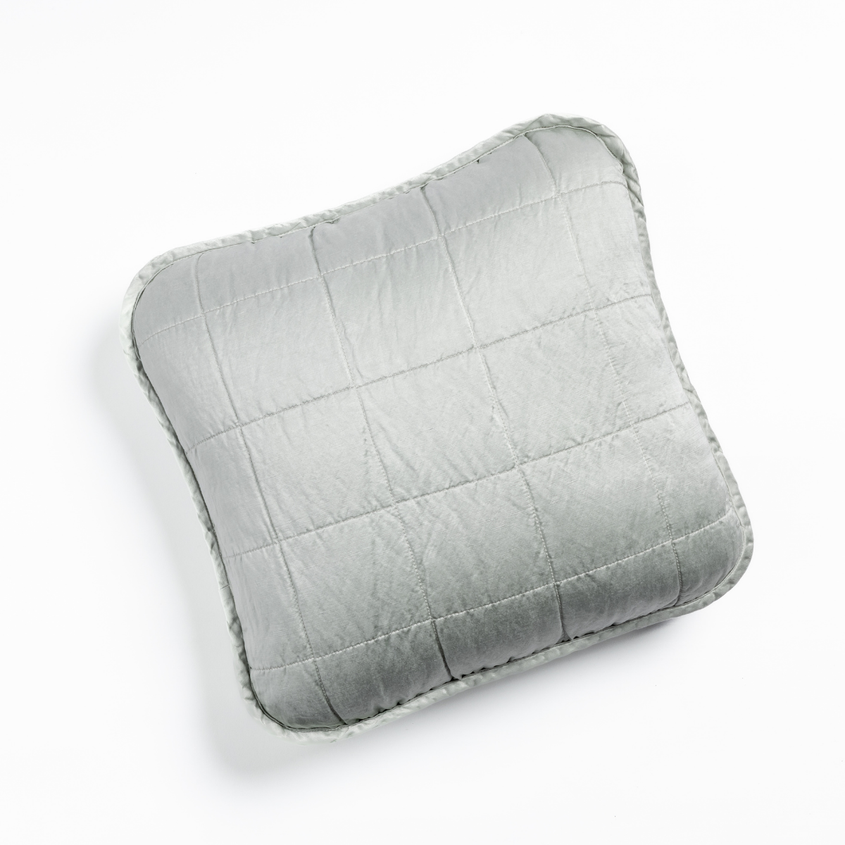 Cloud: An overhead shot of a square-quilted square throw pillow in cloud, a subtle sky blue-grey, against a white background.