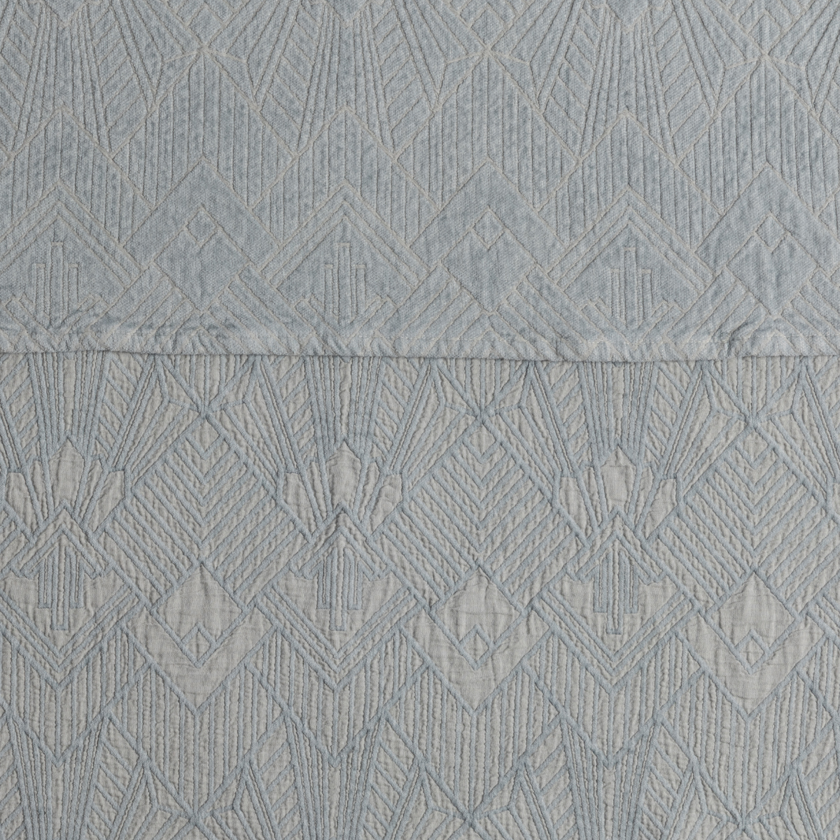 Cloud: a close-up showing the chenille jacquard on the top half and cotton jacquard on the bottom in cloud, a pale light blue.