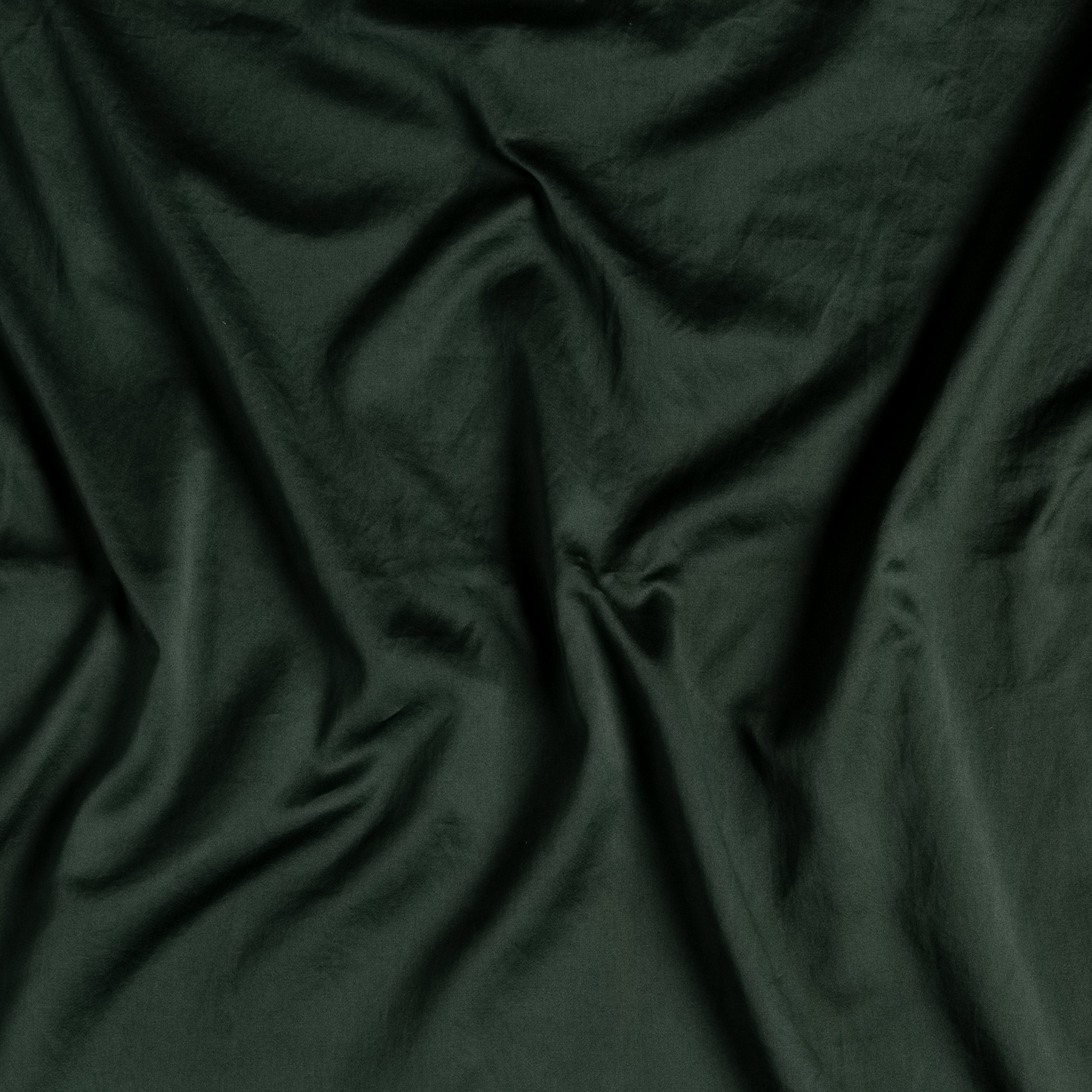 Juniper: a close up of cotton sateen gently rumpled in juniper, a dark green tone