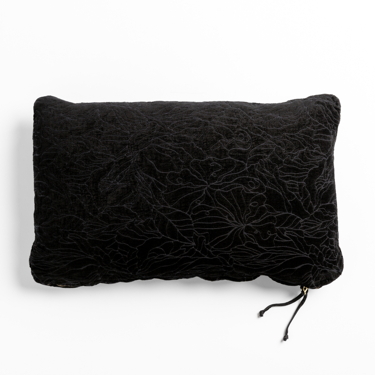 Corvino: chenille jacquard side of a rectangle throw pillow shown from overhead against a white background.