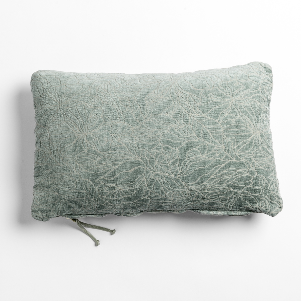 Eucalyptus: chenille jacquard side of a rectangle throw pillow shown from overhead against a white background.