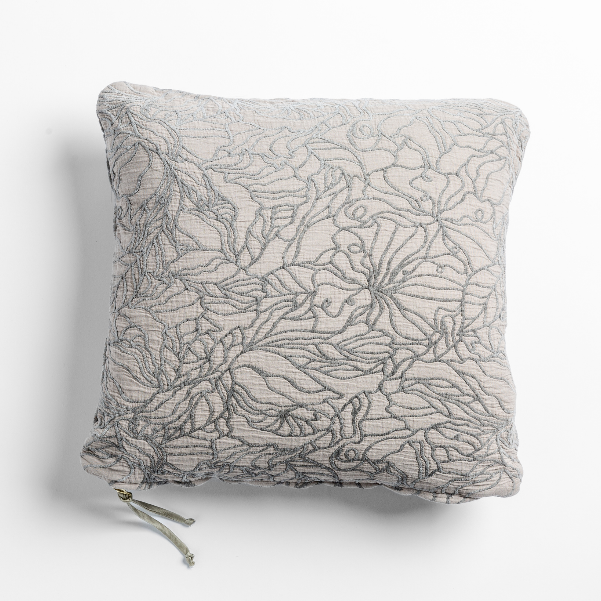 Fog: cotton jacquard side of a georgia square cushion shown from overhead against a white background.