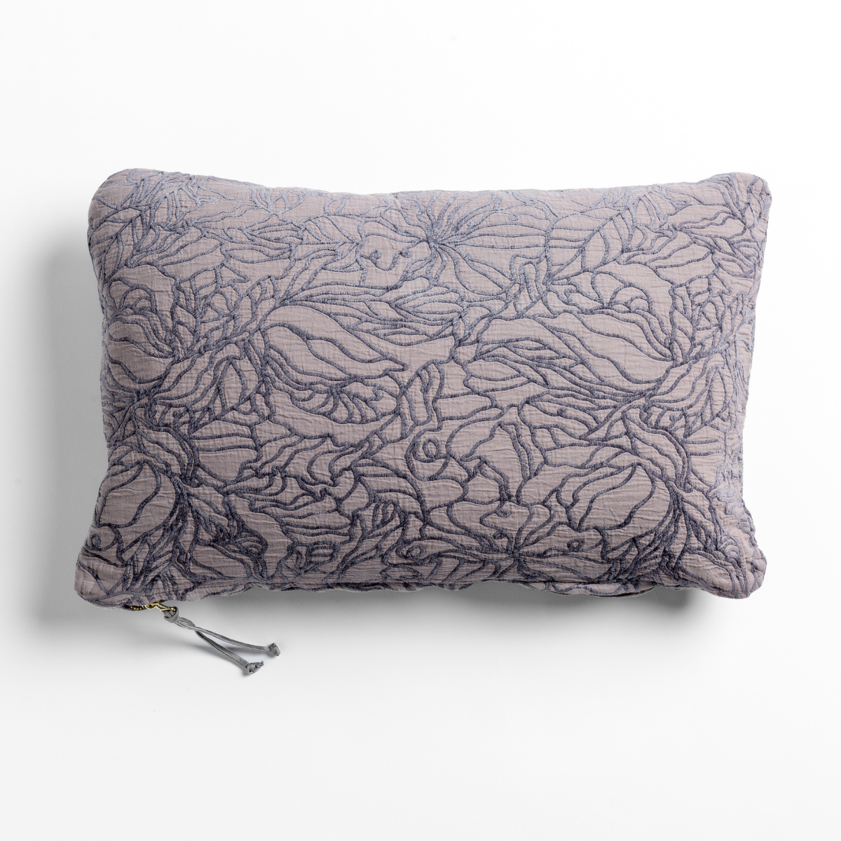 French Lavender: cotton jacquard side of a rectangle throw pillow shown from overhead against a white background.