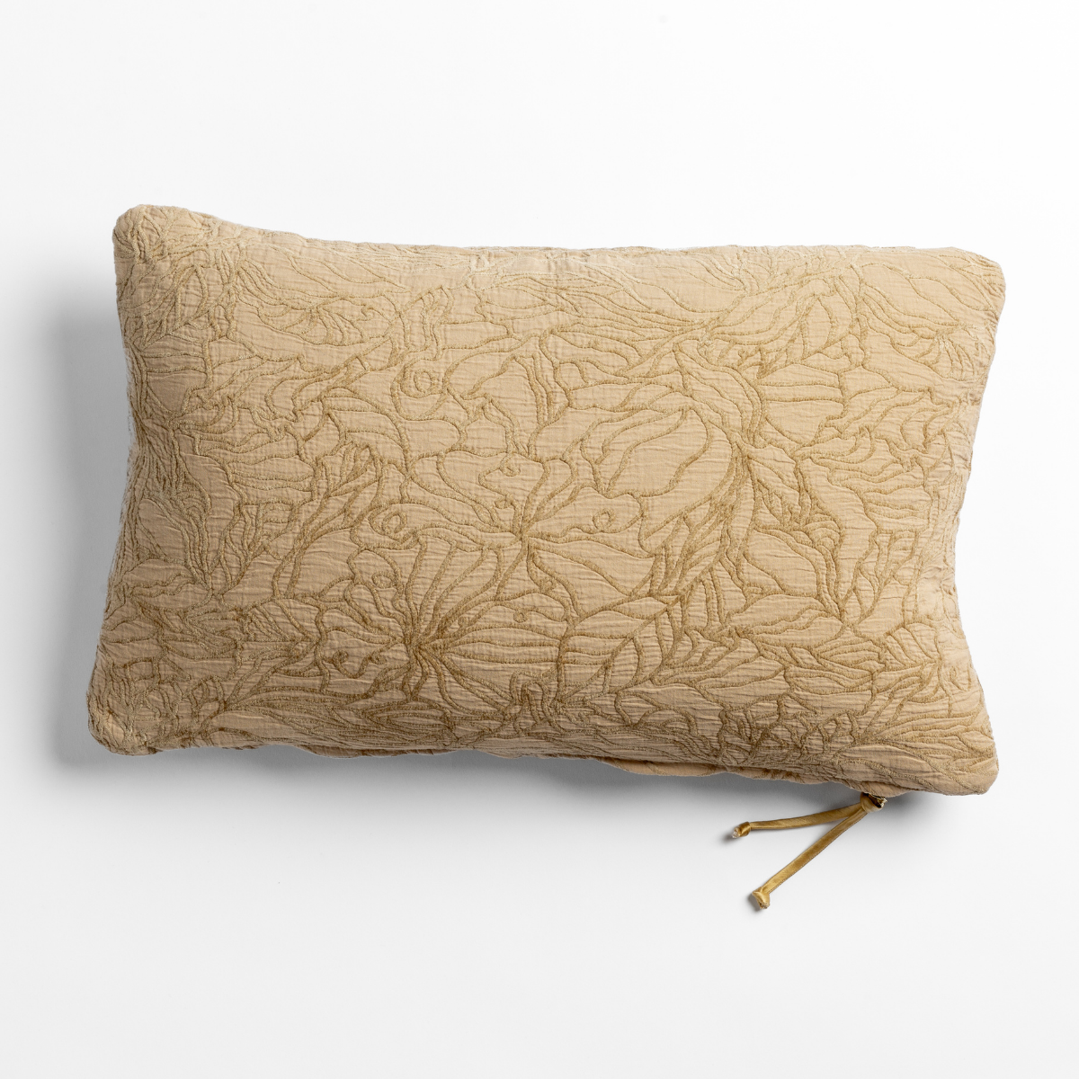 Honeycomb: cotton jacquard side of a rectangle throw pillow shown from overhead against a white background.