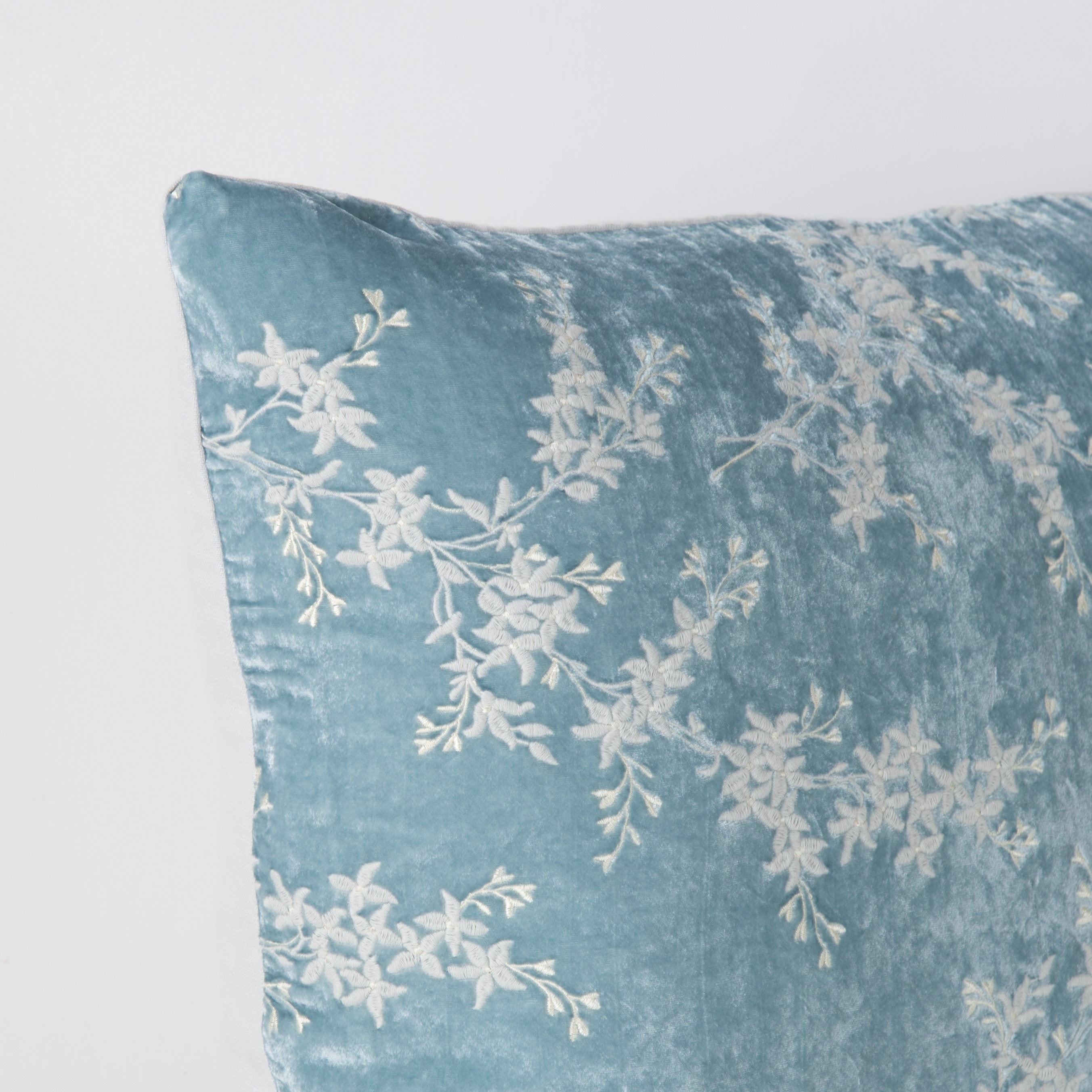 Cloud: Corner detail close-up, highlighting two-tone embroidery and linen back.