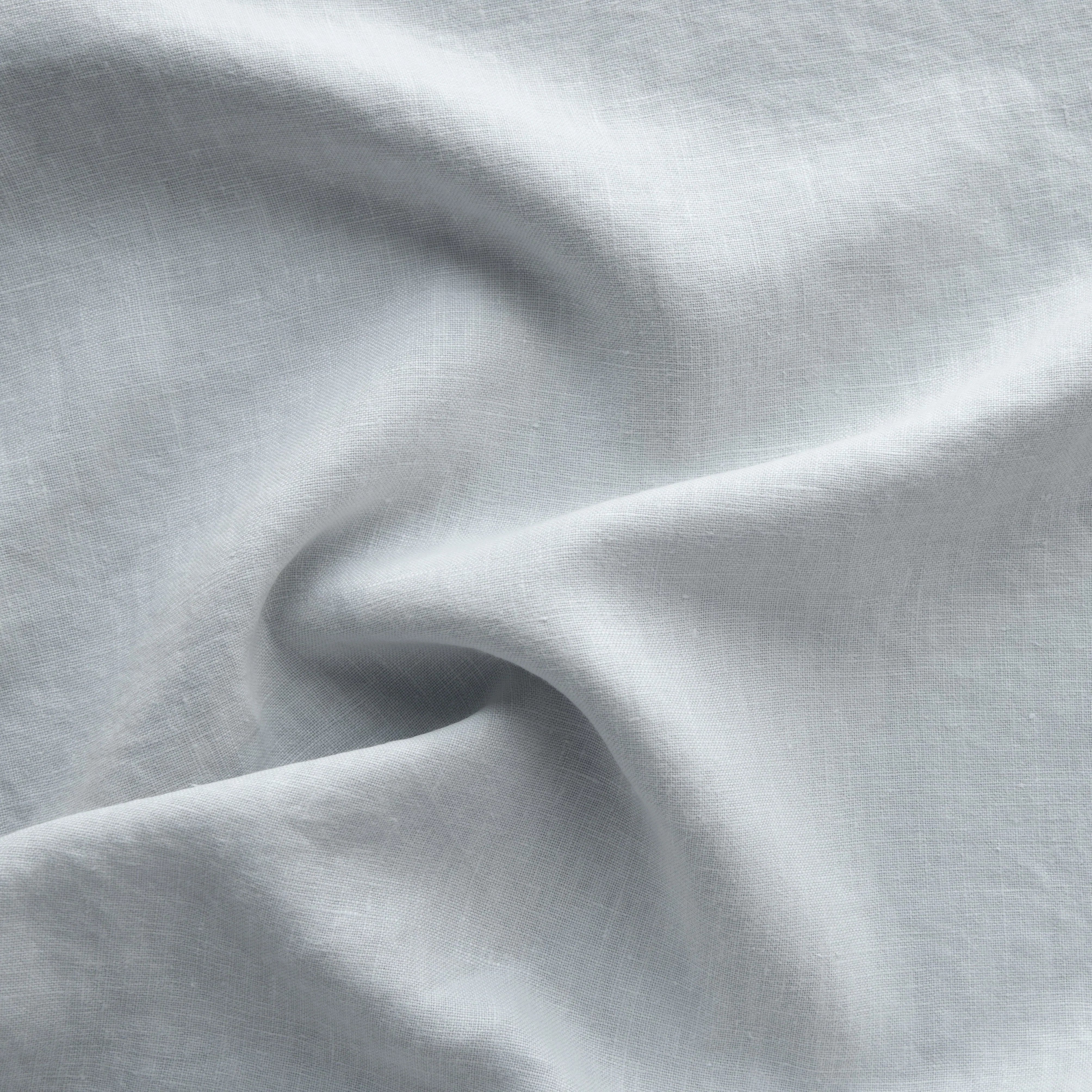 Cloud: A close up of midweight linen in cloud, a soft, subtle sky blue-grey.