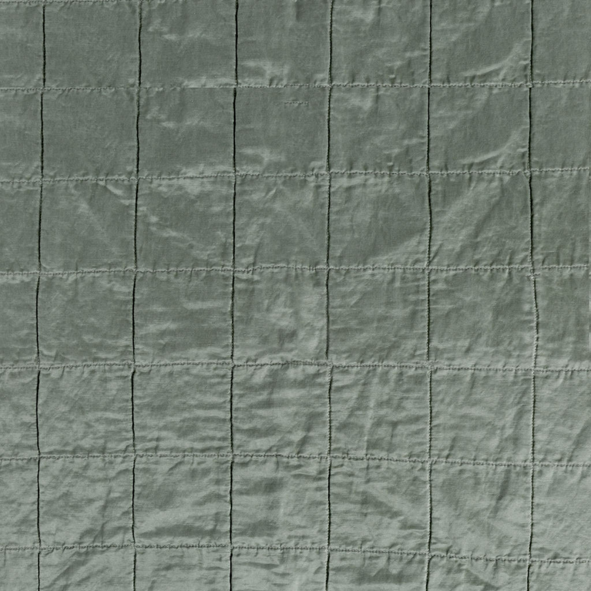 Eucalyptus: a shot of square-quilted charmeuse in eucalyptus, a soft light green.