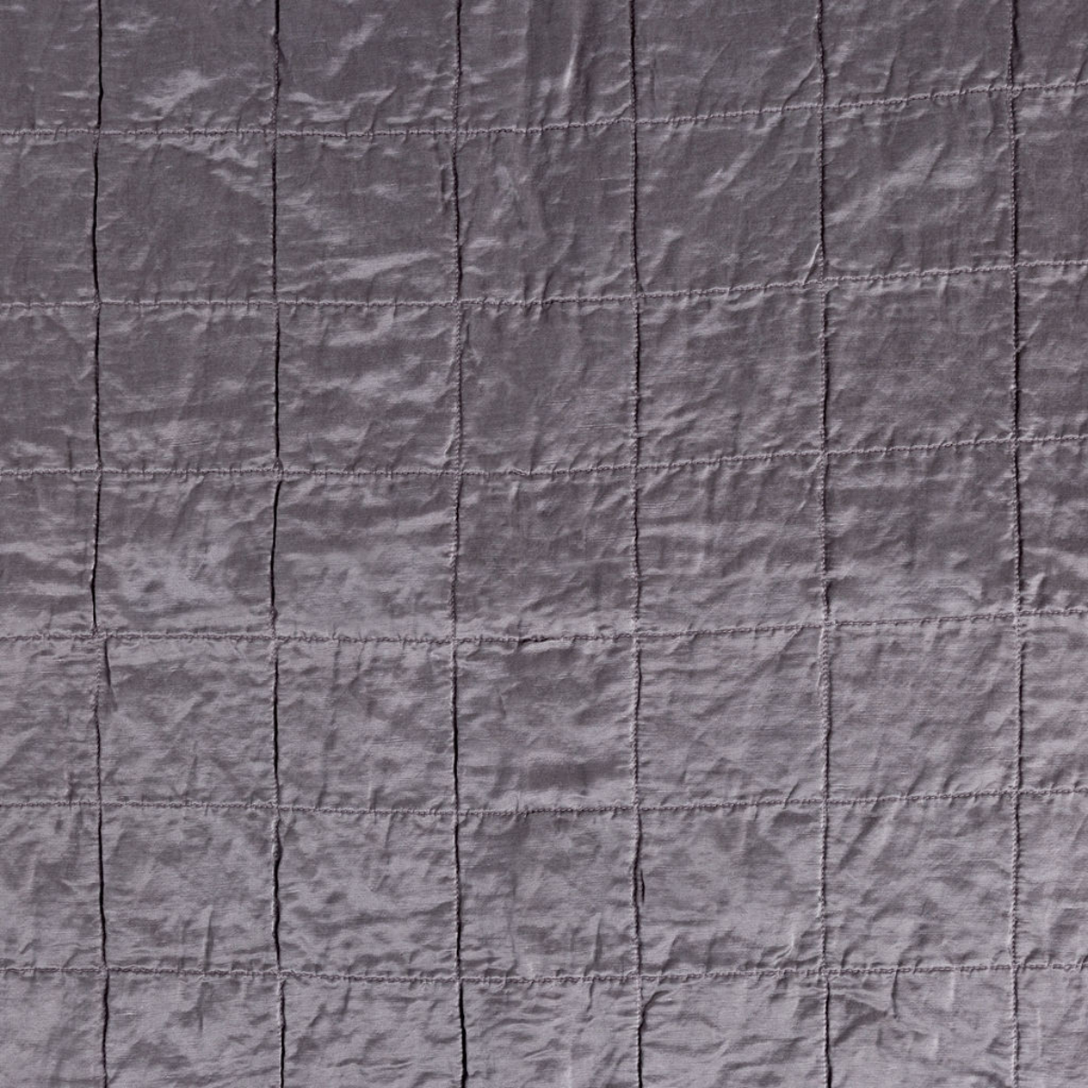 French Lavender: a shot of square-quilted charmeuse in french lavender, a neutral violet tone.