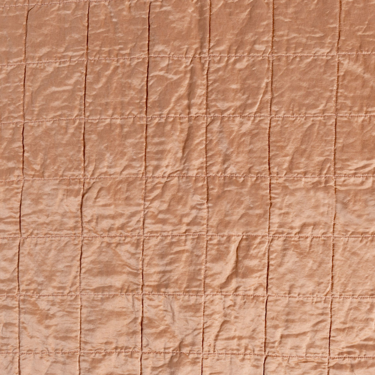 Rouge: a shot of square-quilted charmeuse in rouge, a mid-tone blush pink.