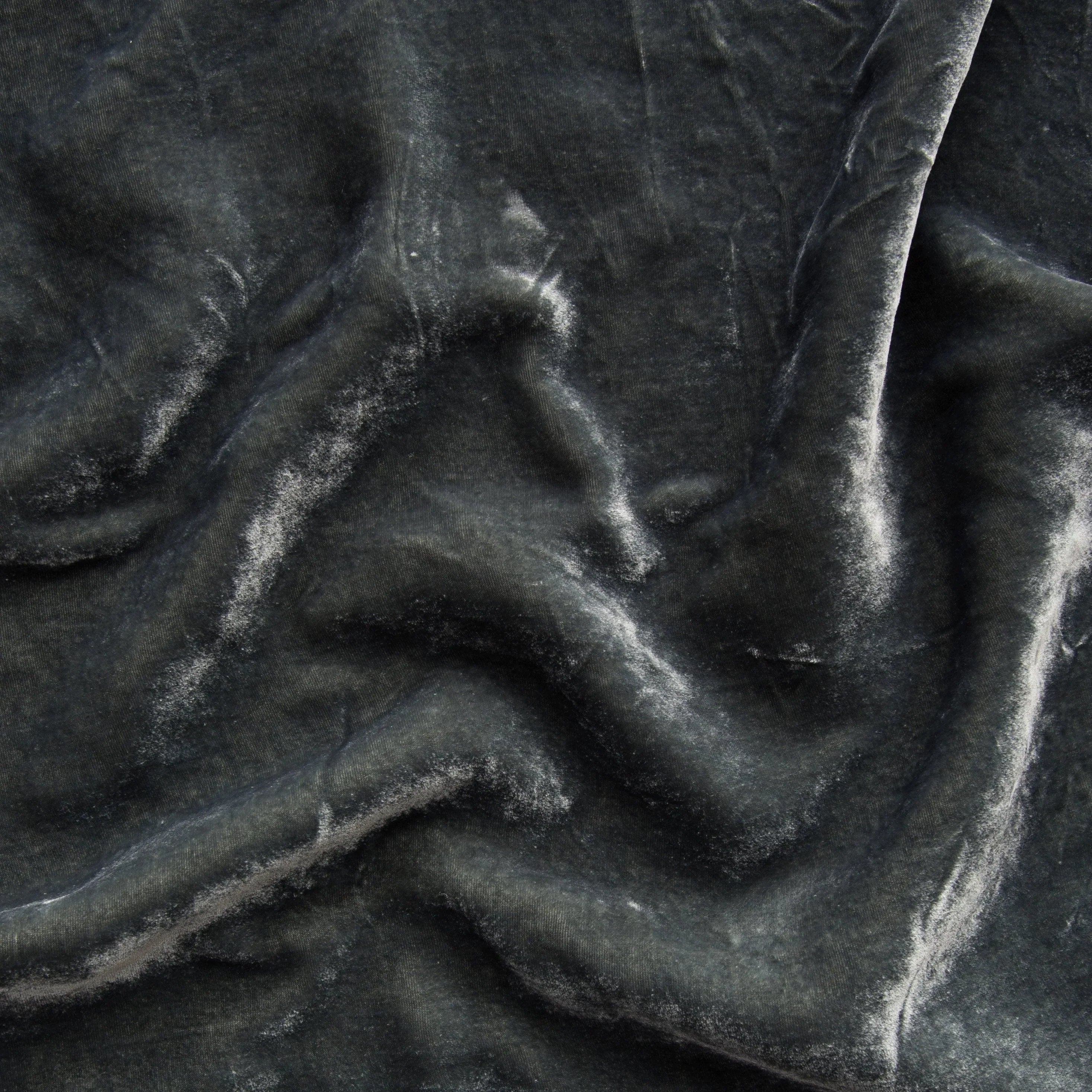 Fog: A close up of silk velvet in fog, a neutral-warm, saturated mid-tone grey.