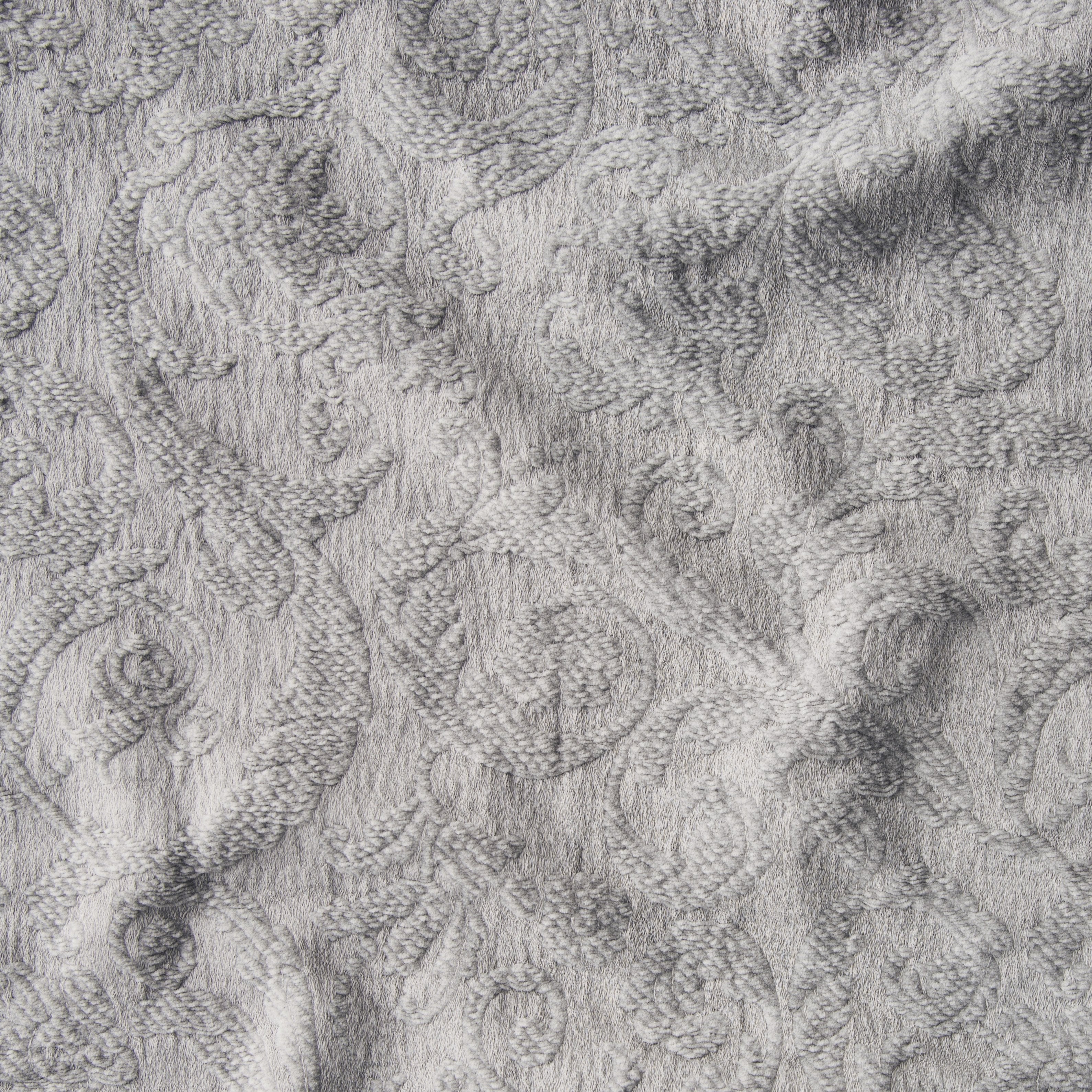 Fog: A close up of Adele fabric in fog, a neutral-warm, soft mid-tone grey. The fabric is rumpled to show the cotton damask texture.