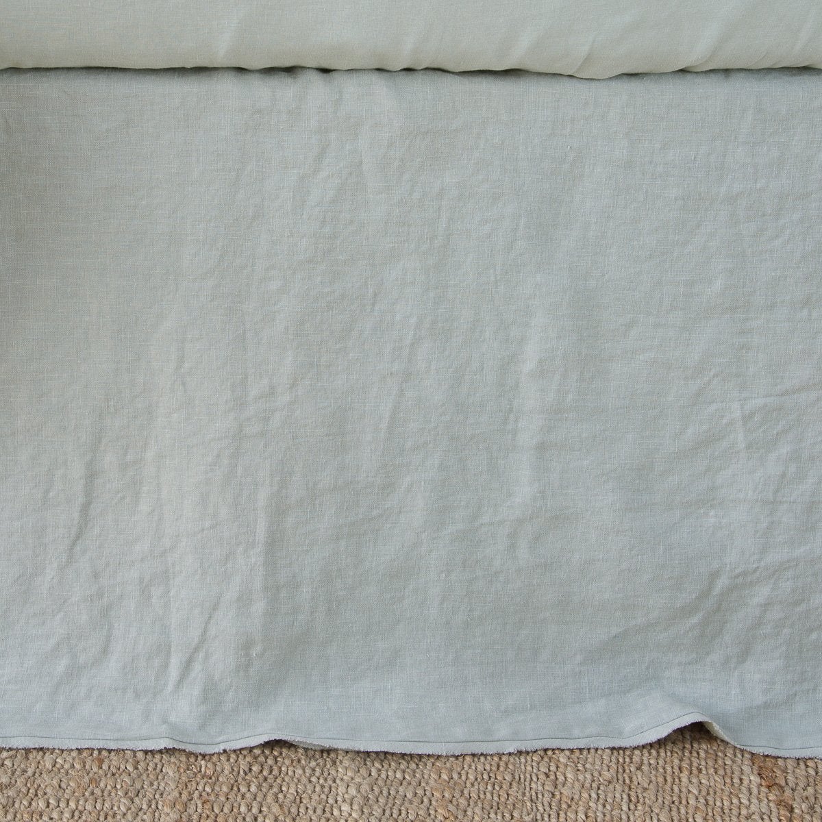 Eucalyptus: Close up of the Austin bed skirt in eucalyptus, highlighting its tailored, ungathered style.