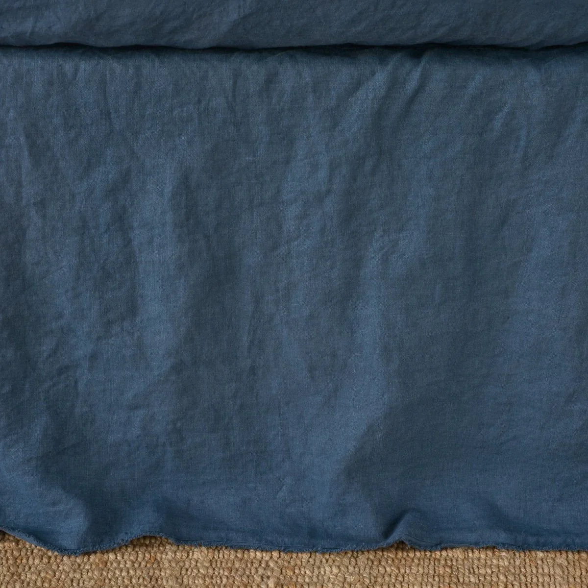 Midnight: Close up of the Austin bed skirt in midnight, highlighting its tailored, ungathered style.