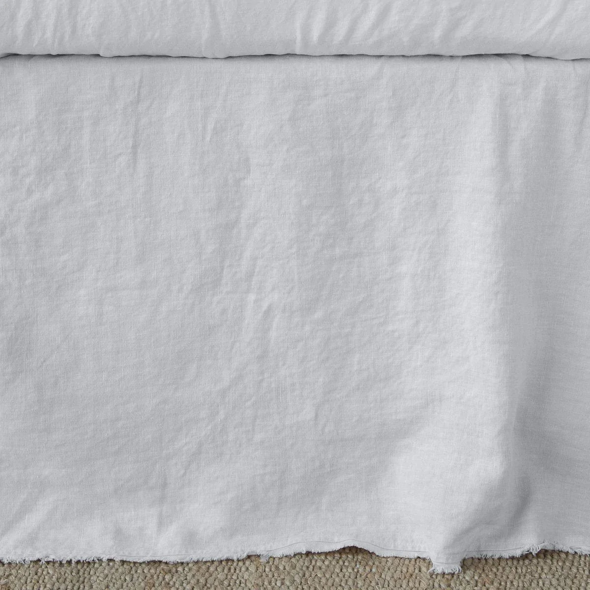 Sterling: Close up of the Austin bed skirt in sterling, highlighting its tailored, ungathered style.