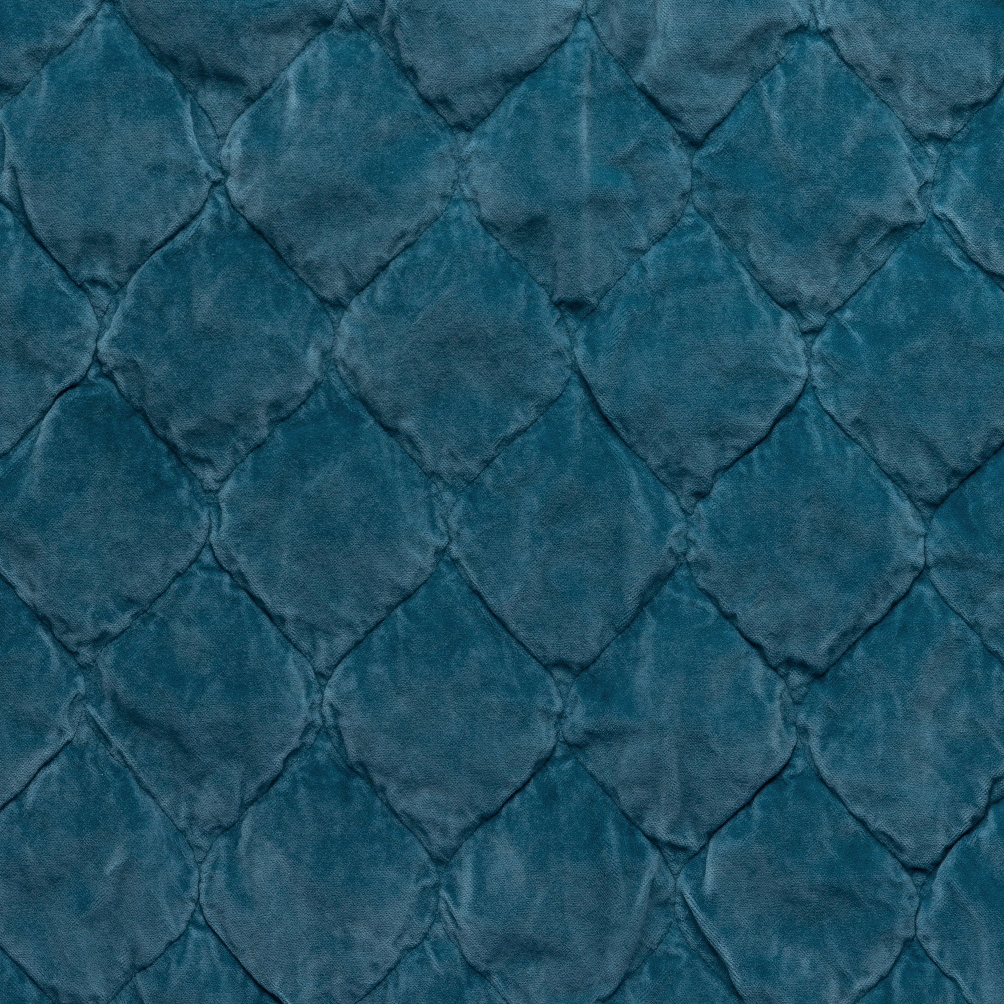 Cenote: Close-up of Harlow cotton velvet quilting in cenote, a vibrant, ocean-inspired blue-green.