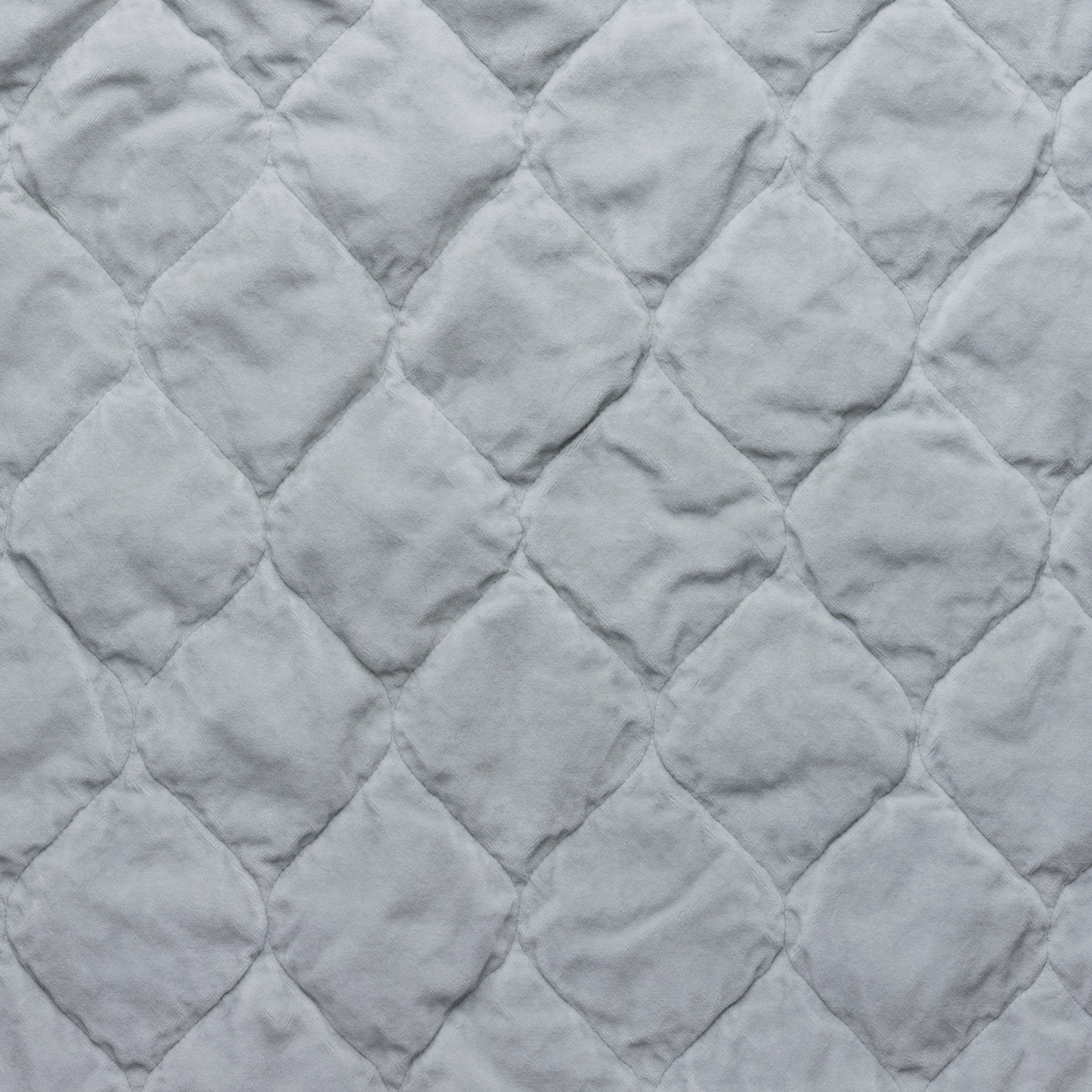 Cloud: Close-up of Harlow cotton velvet quilting in cloud, a soft, subtle sky blue-grey.