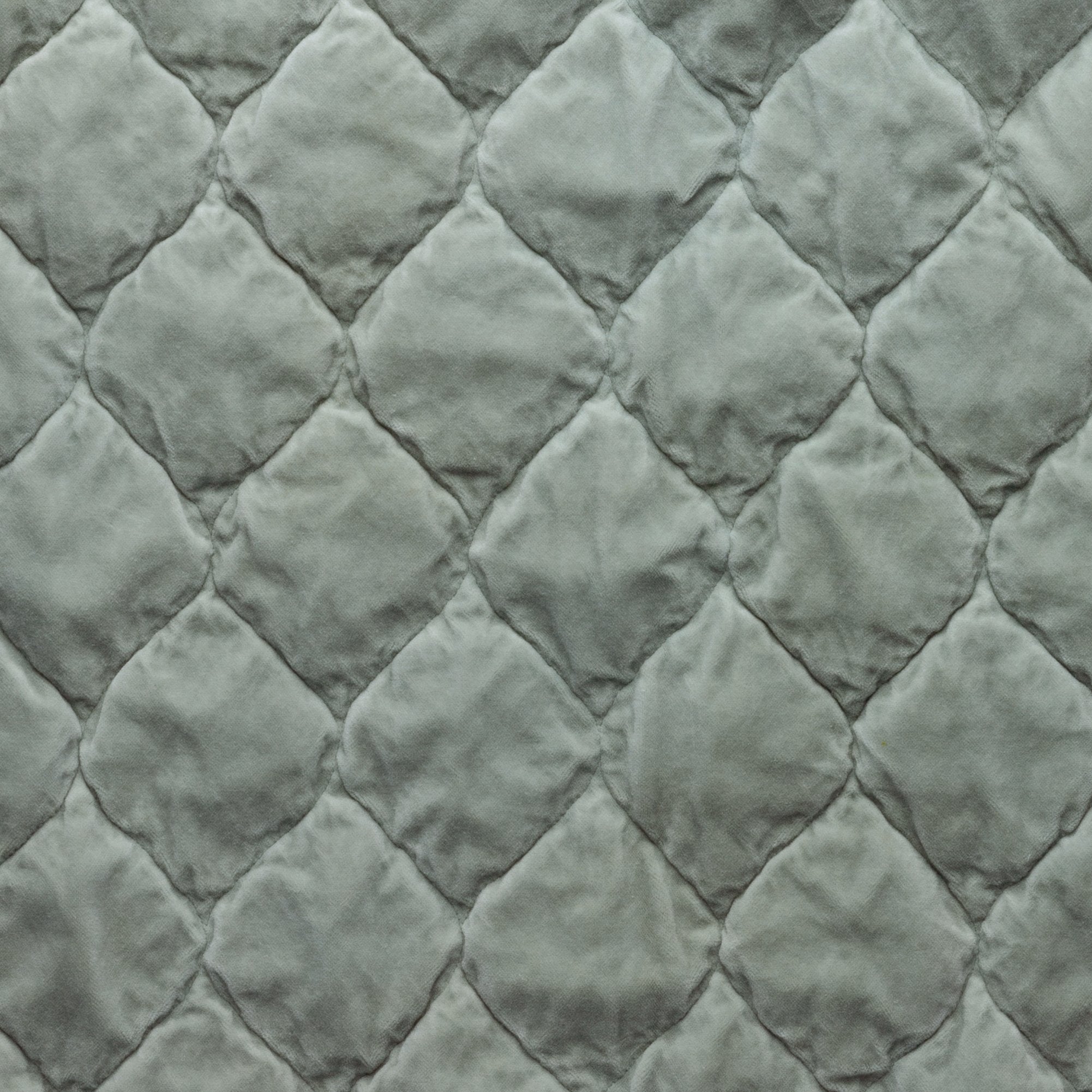 Eucalyptus: Close-up of Harlow cotton velvet quilting in eucalyptus, a soft light green.