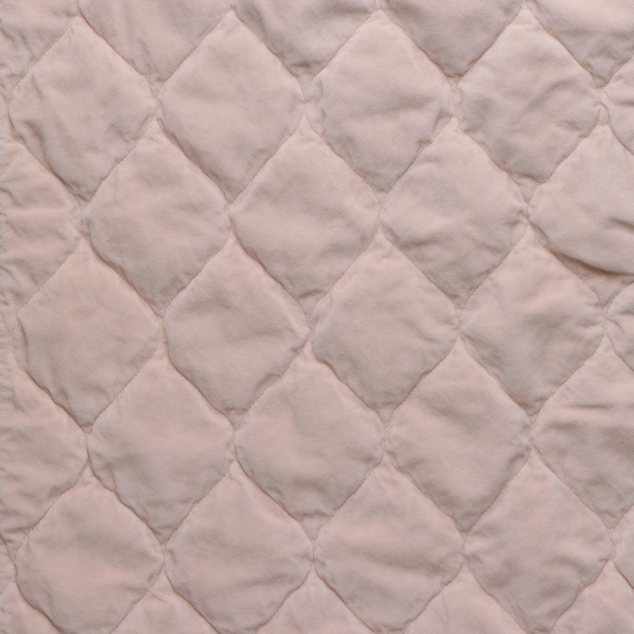 Pearl: Close-up of Harlow cotton velvet quilting in pearl, a nude-like, soft rose pink tone.