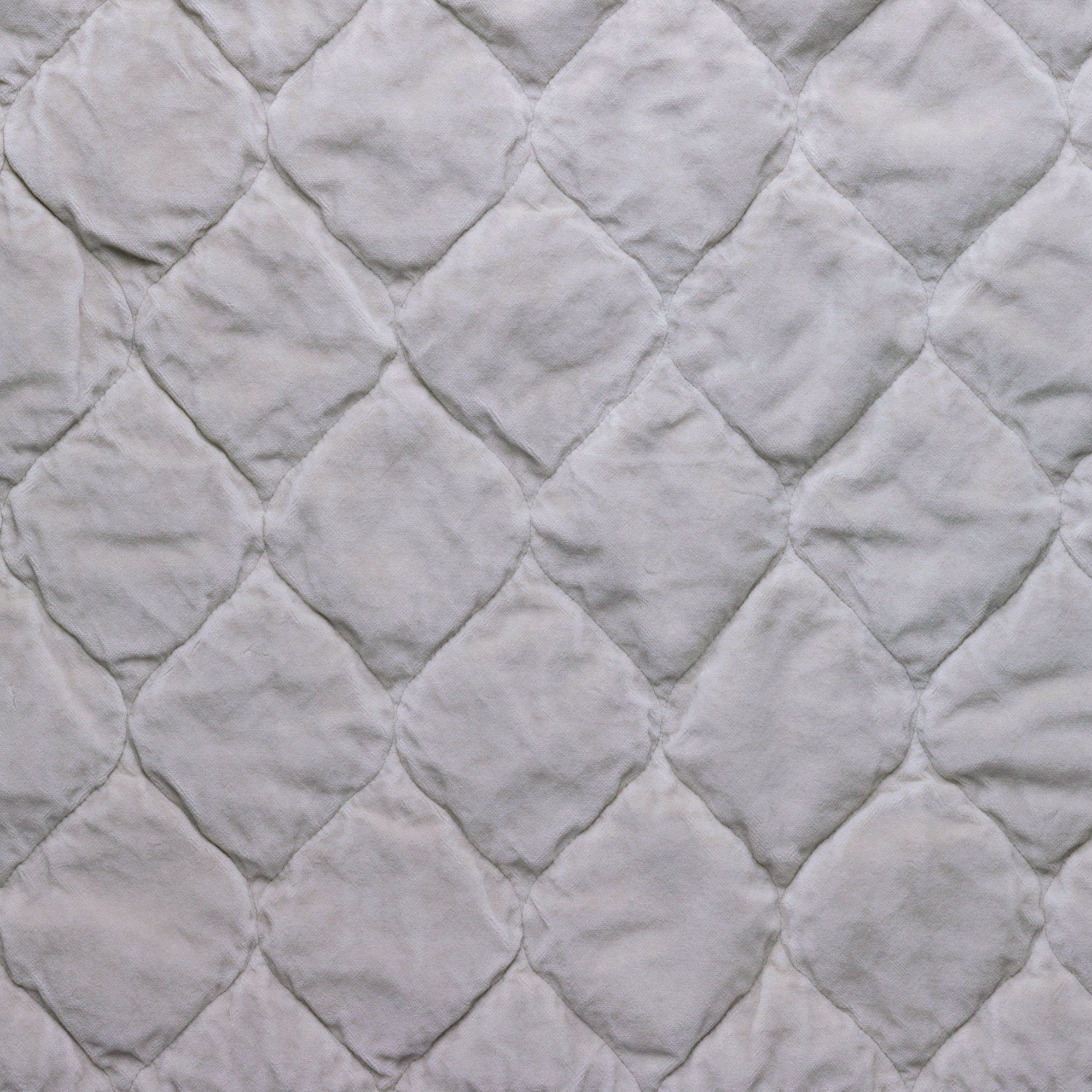 Sterling: Close-up of Harlow cotton velvet quilting in sterling, a silvery neutral light grey.