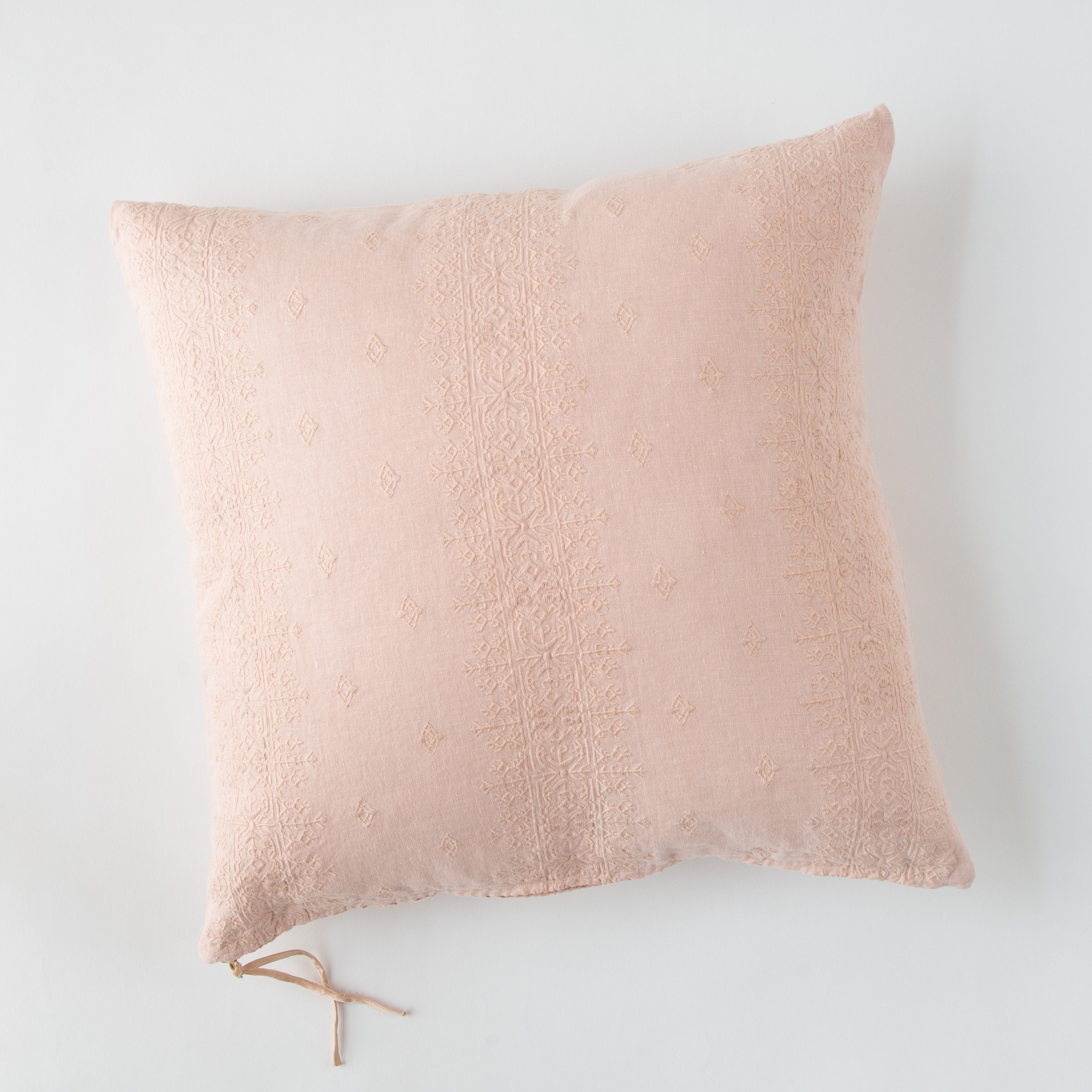 Rouge: pillow on a white background - overhead view.
