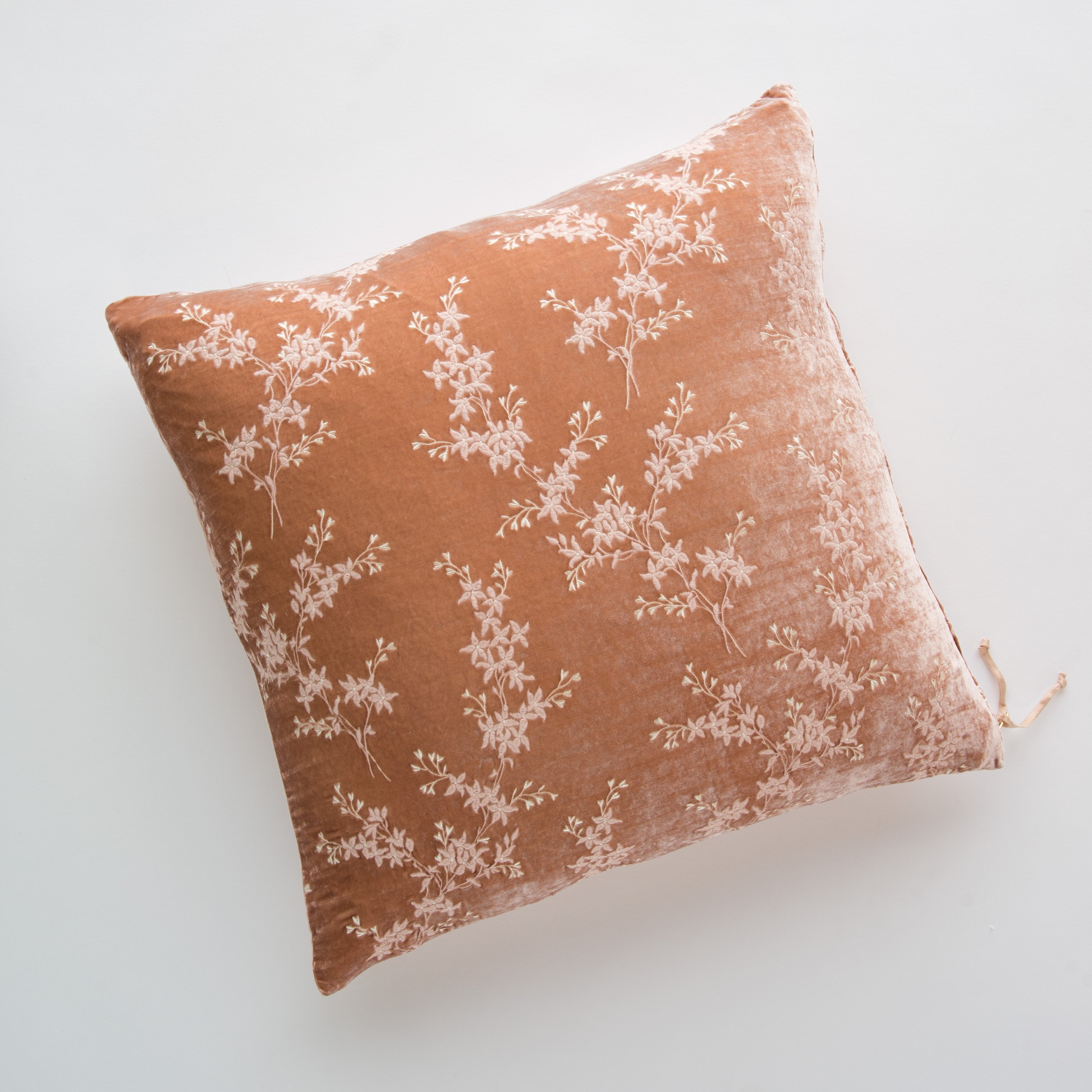 Rouge: Lynette 24 by 24 pillow against a plain background - rouge, overhead view.