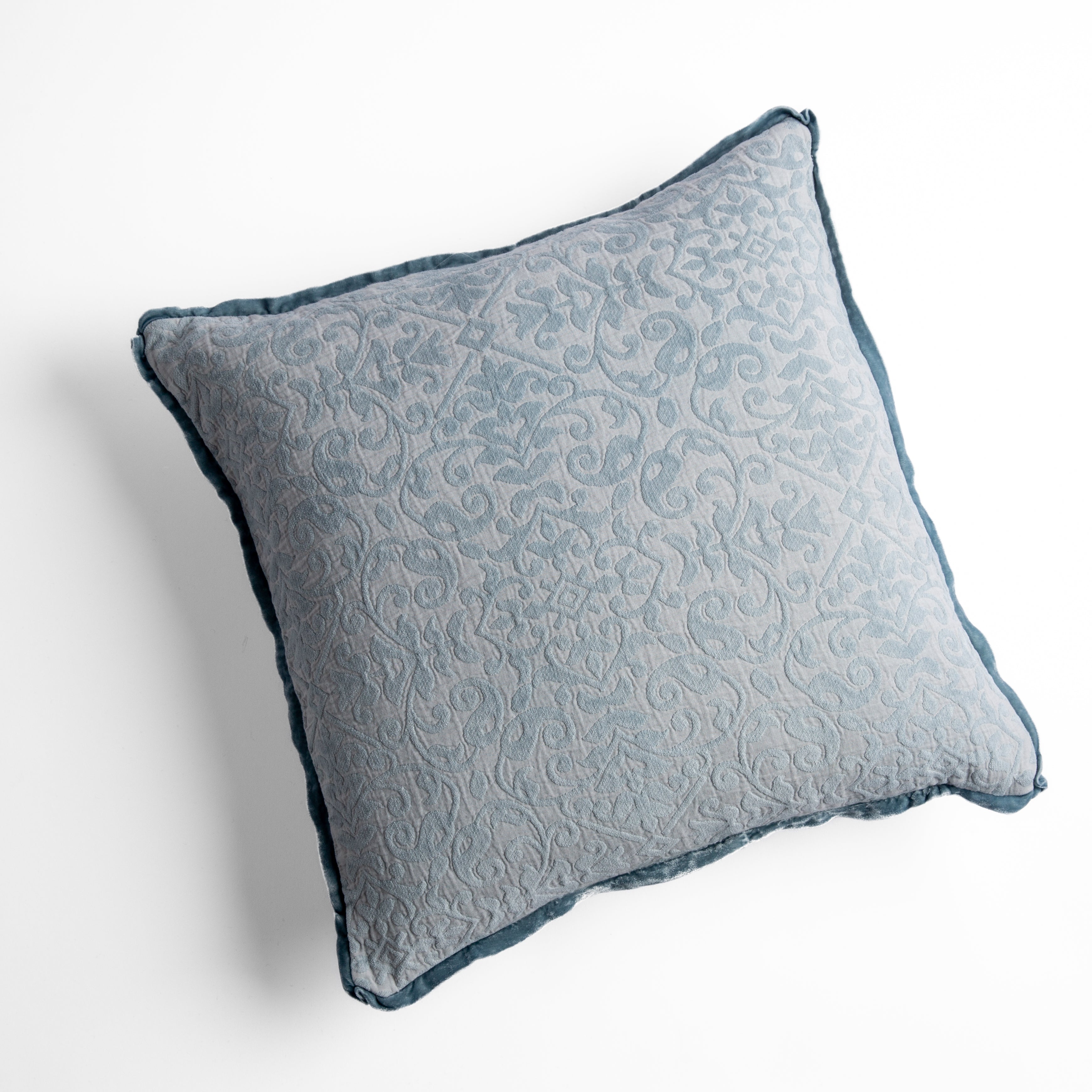 Cloud: cotton chenille jacquard 18x18 pillow shown from overhead to display the pillow's face and silk velvet trim β overhead against a white background.