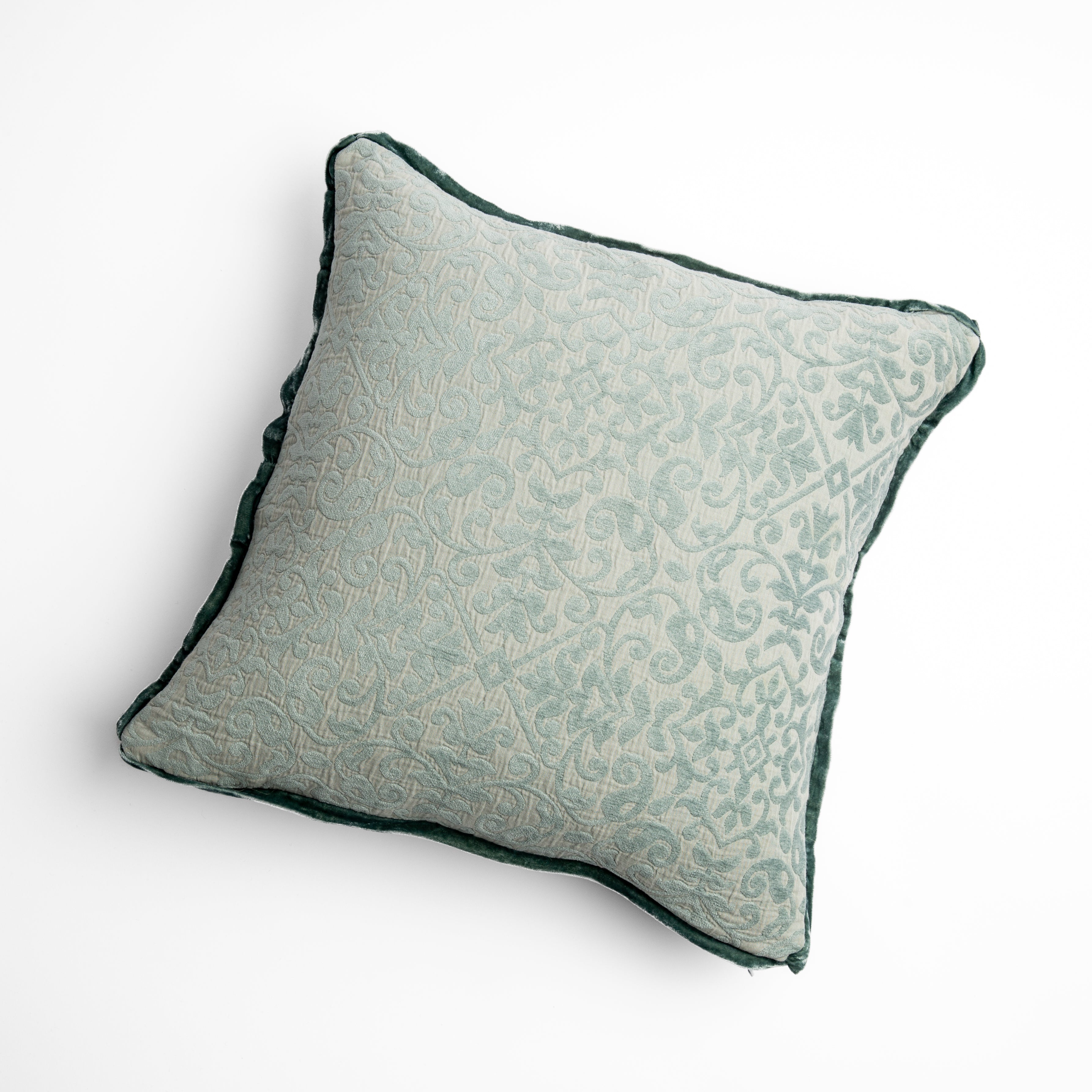Eucalpytus: cotton chenille jacquard 18x18 pillow shown from overhead to display the pillow's face and silk velvet trim β overhead against a white background.