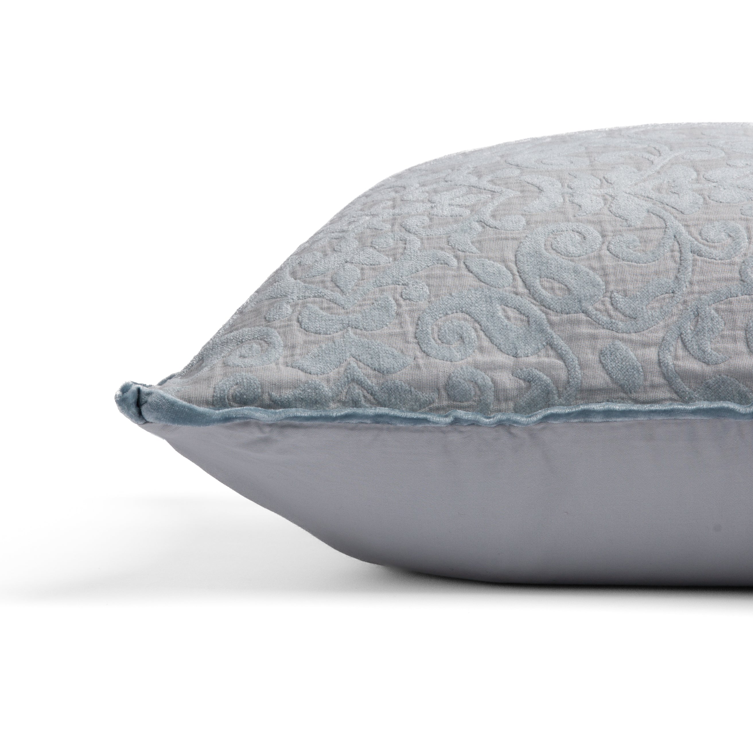Cloud: side view of 18x18 pillow shows cotton sateen back and silk velvet trim detail β close up against a white background.