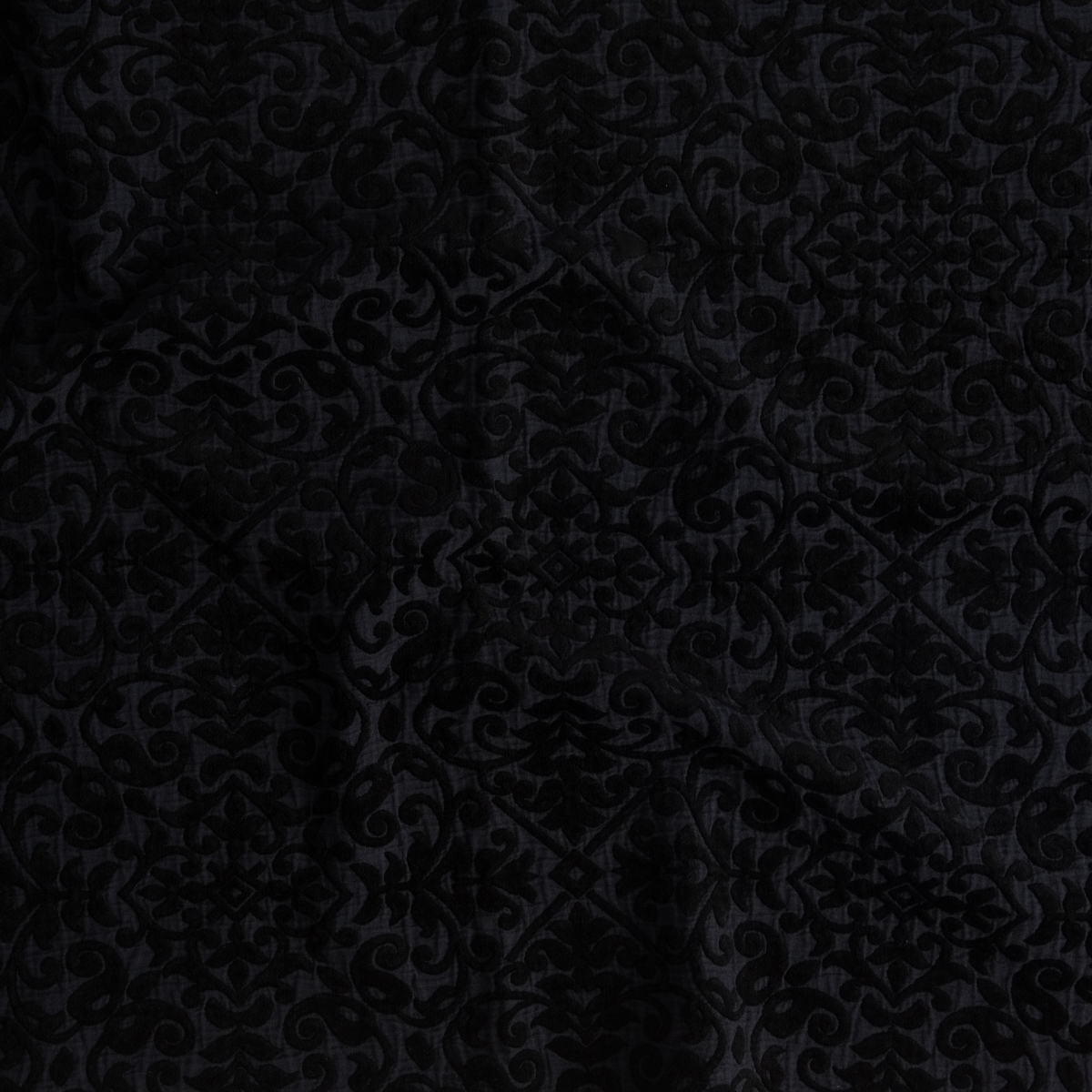 Corvino: A close up of vienna fabric in Corvino, a black tone