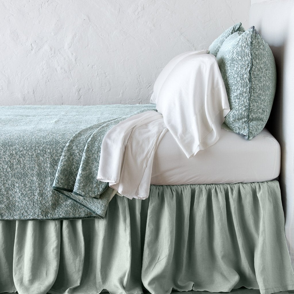 Eucalyptus: Cotton chenille jacquard coverlet and matching sham over white sheeting - side view.