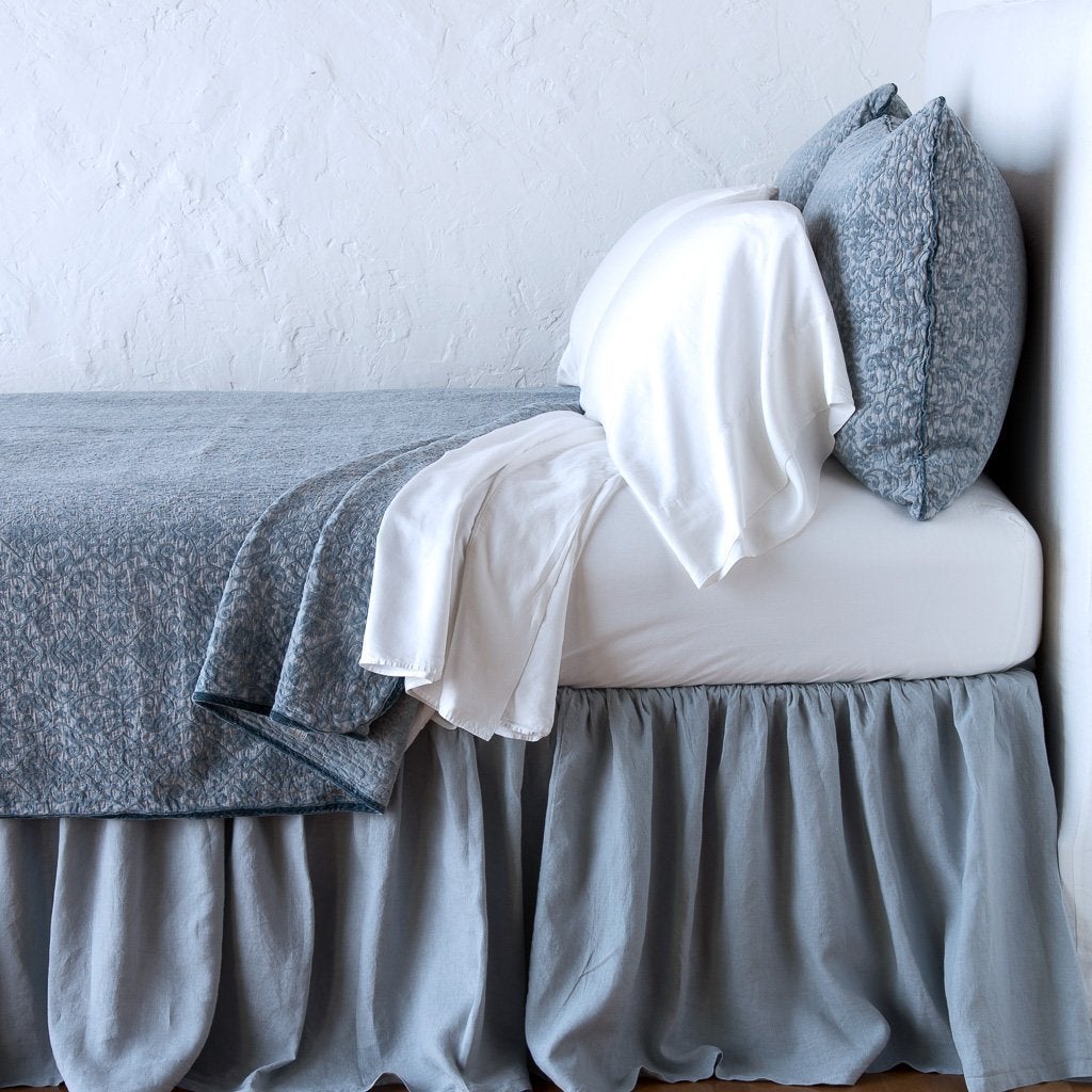 Mineral: Cotton chenille jacquard coverlet and matching sham over white sheeting - side view.