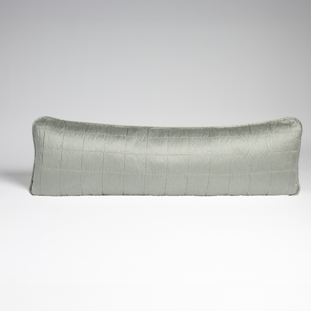 Mineral: A straight-on shot of a square-quilted body pillow in mineral, a soothing seafoam blue with subtle grey-green undertones, against a white background. 