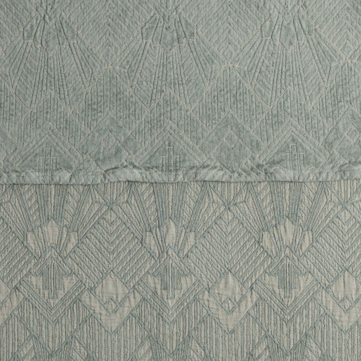 Eucalyptus: a close-up showing the chenille jacquard on the top half and cotton jacquard on the bottom in eucalyptus, a delicate green.
