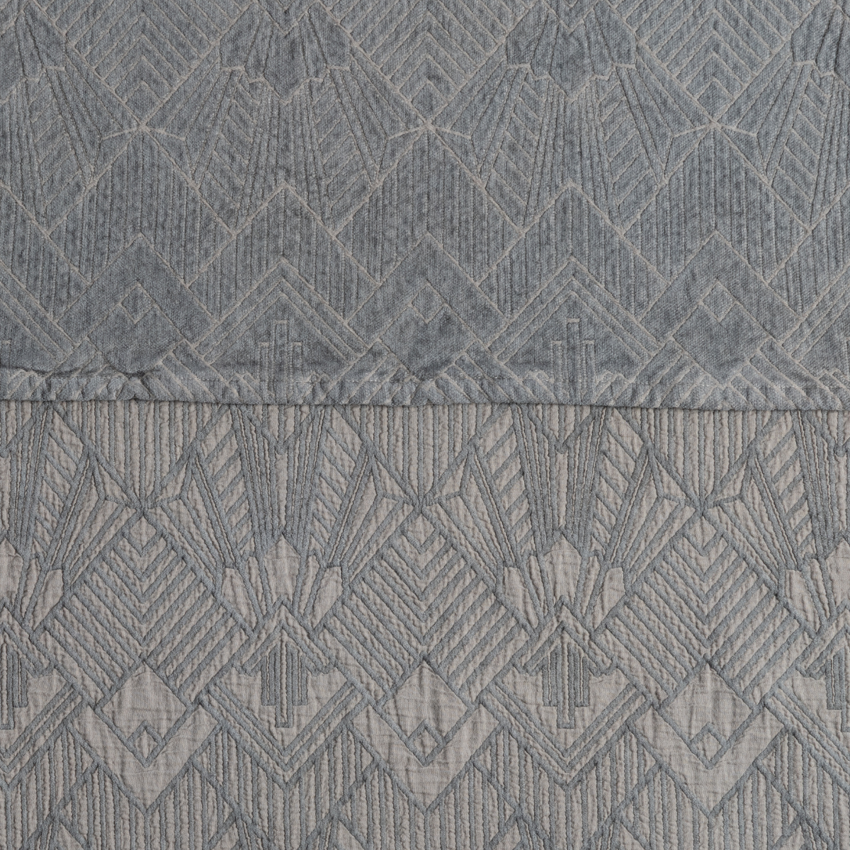 Fog: a close-up showing the chenille jacquard on the top half and cotton jacquard on the bottom in fog, a midtone grey.