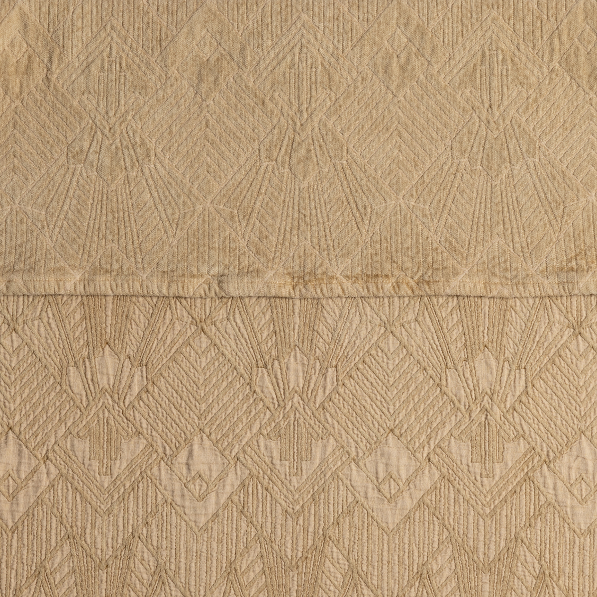Honeycomb: a close-up showing the chenille jacquard on the top half and cotton jacquard on the bottom in honeycomb, a butterscotch tone. 