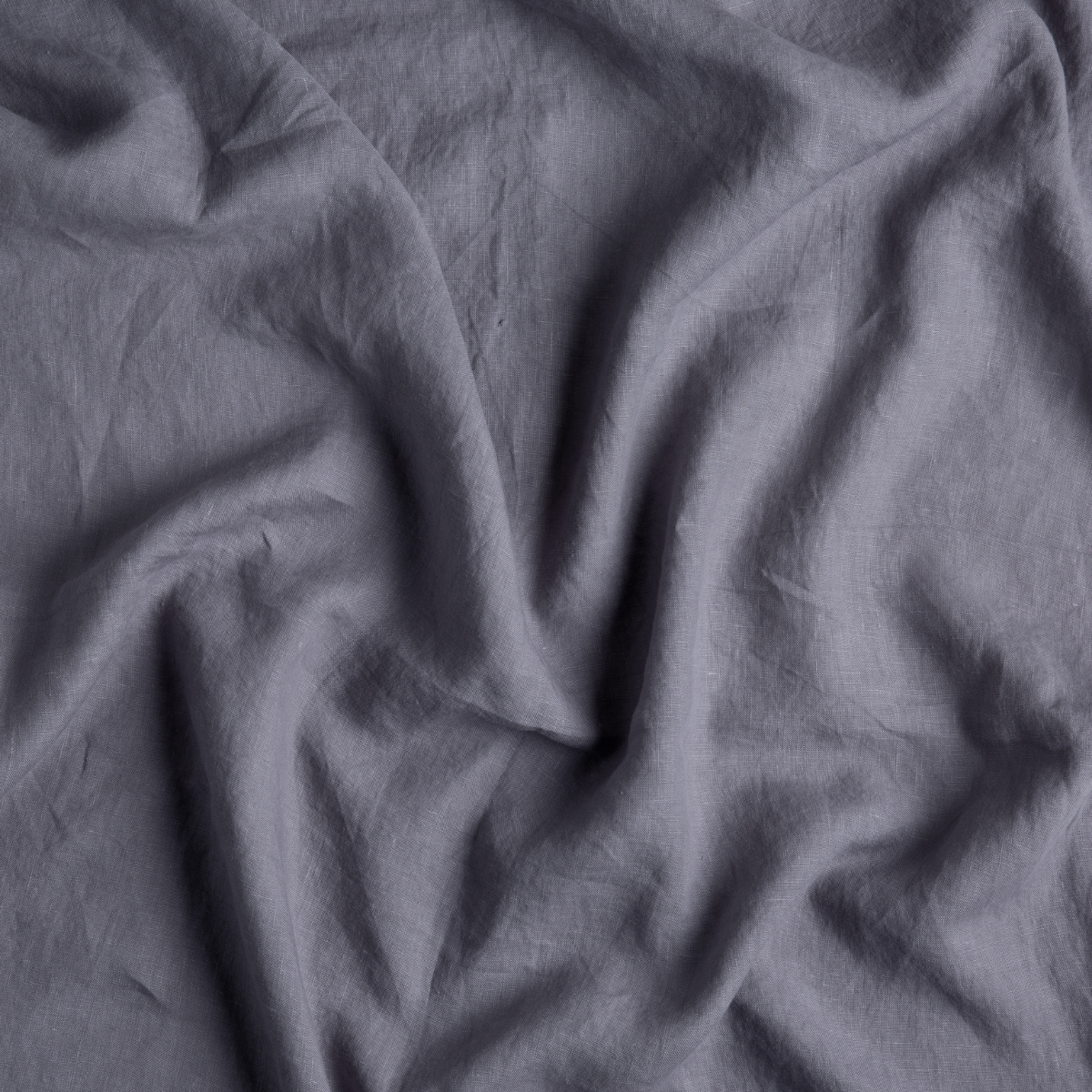 French Lavender: a close up of linen fabric in french lavender, a neutral violet tone.