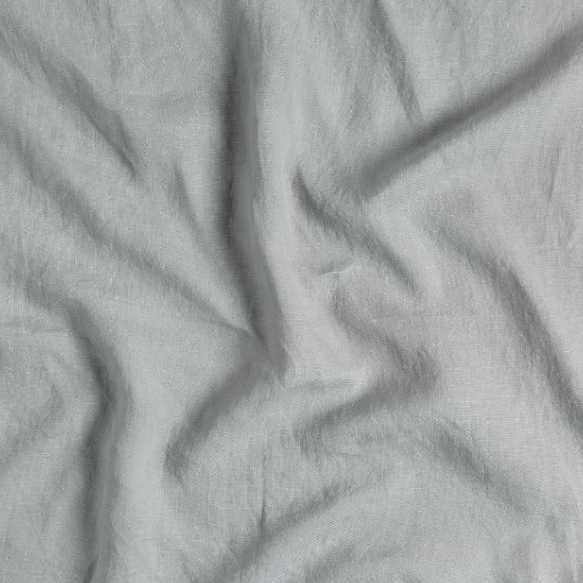 Mineral: A close up of linen fabric in mineral, a soothing seafoam blue with subtle grey-green undertones.
