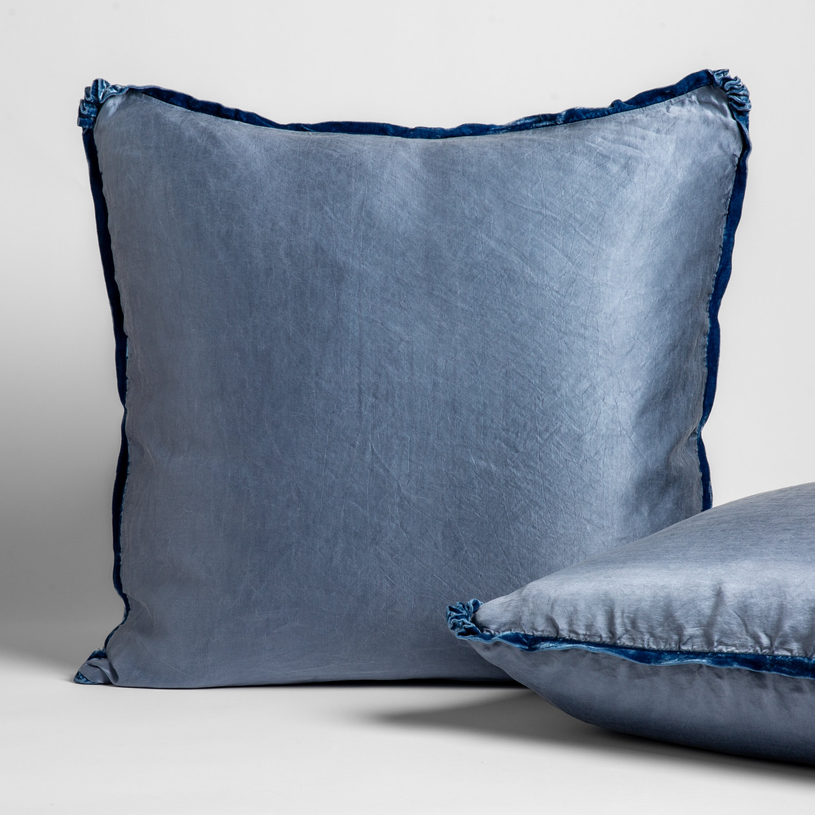 Tahoe Blue: Shams leaning upright on white sheeting against a white background.