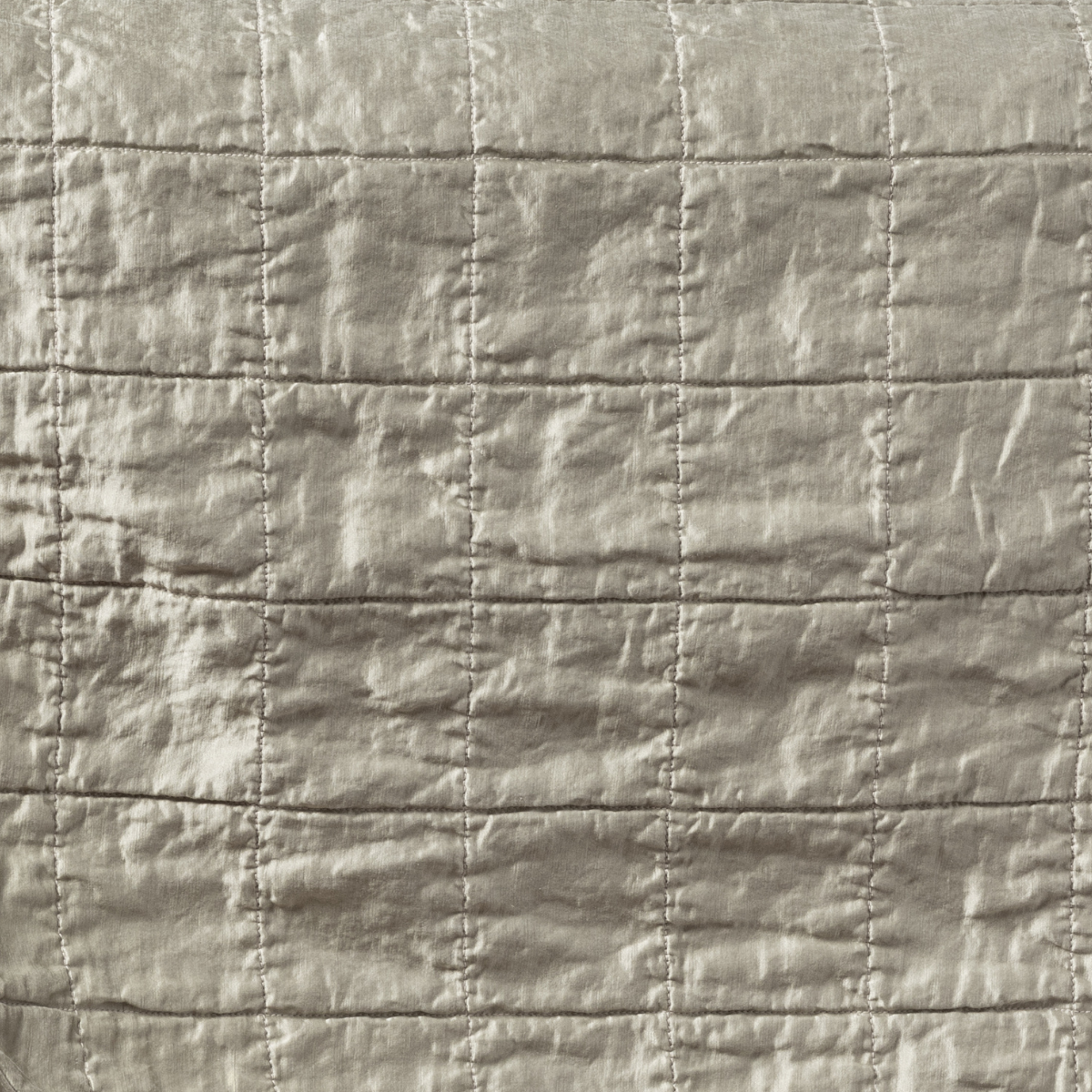 Fog: a shot of square-quilted charmeuse in fog, a soft mid-tone grey