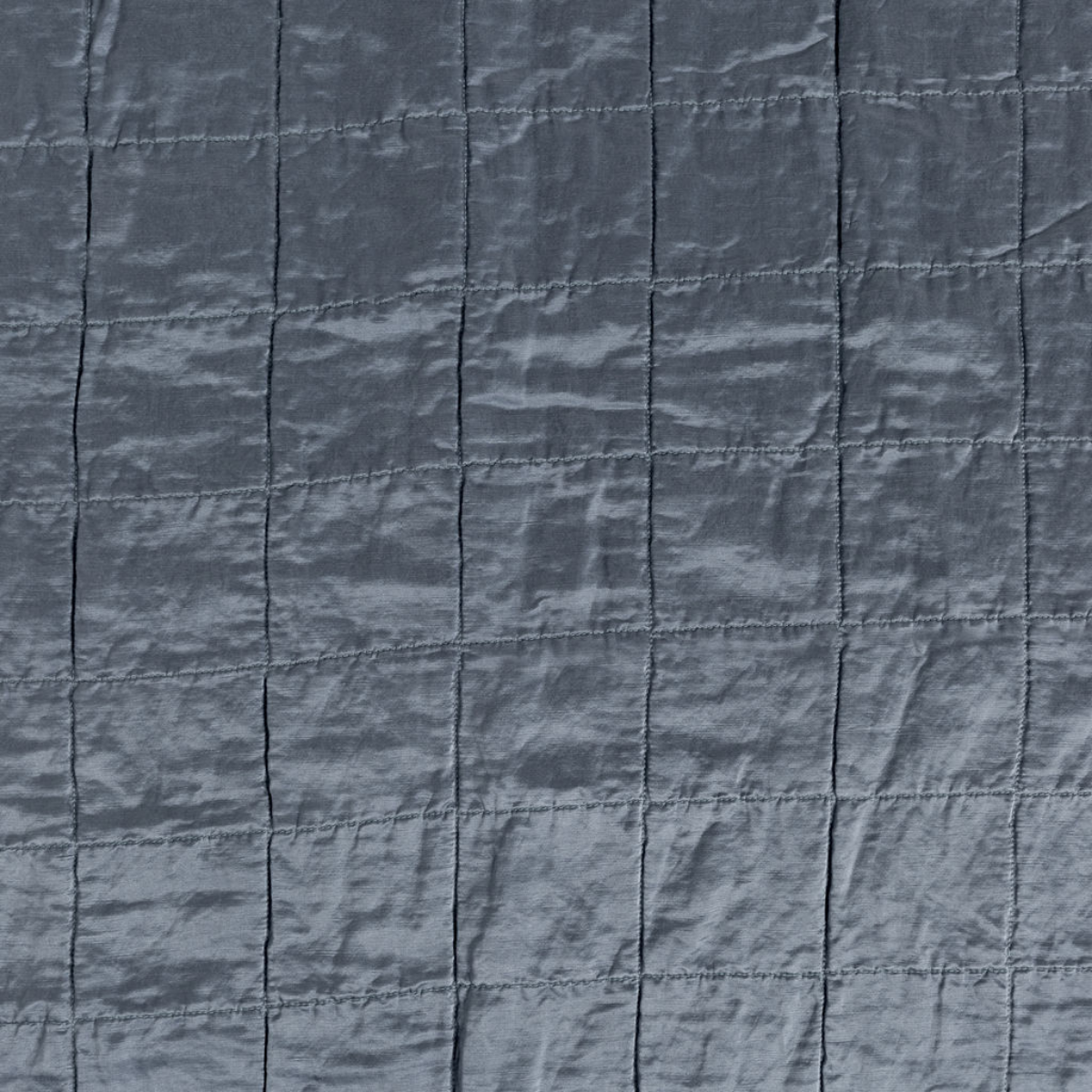 Tahoe Blue: a shot of square-quilted charmeuse in in tahoe blue, a crisp true blue.