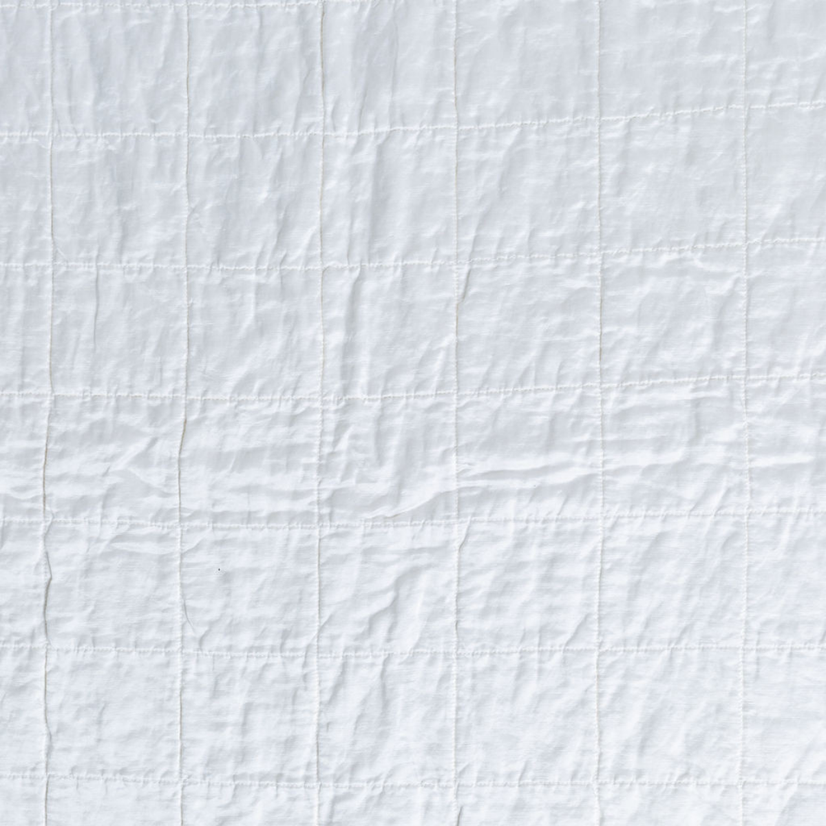White: a shot of square-quilted charmeuse in white.