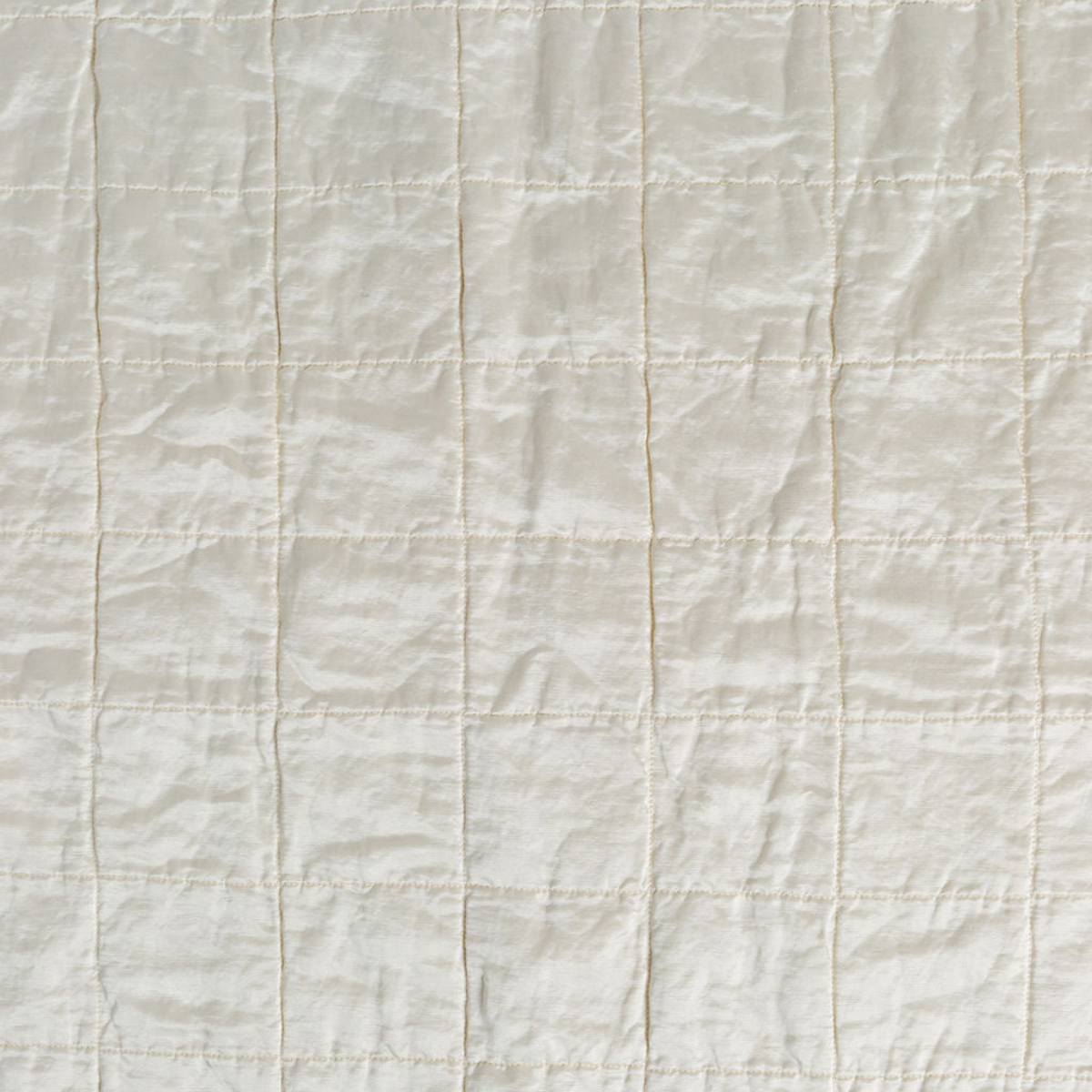 Winter White: a shot of square-quilted charmeuse in winter white, a softer and warmer tone than our classic white.
