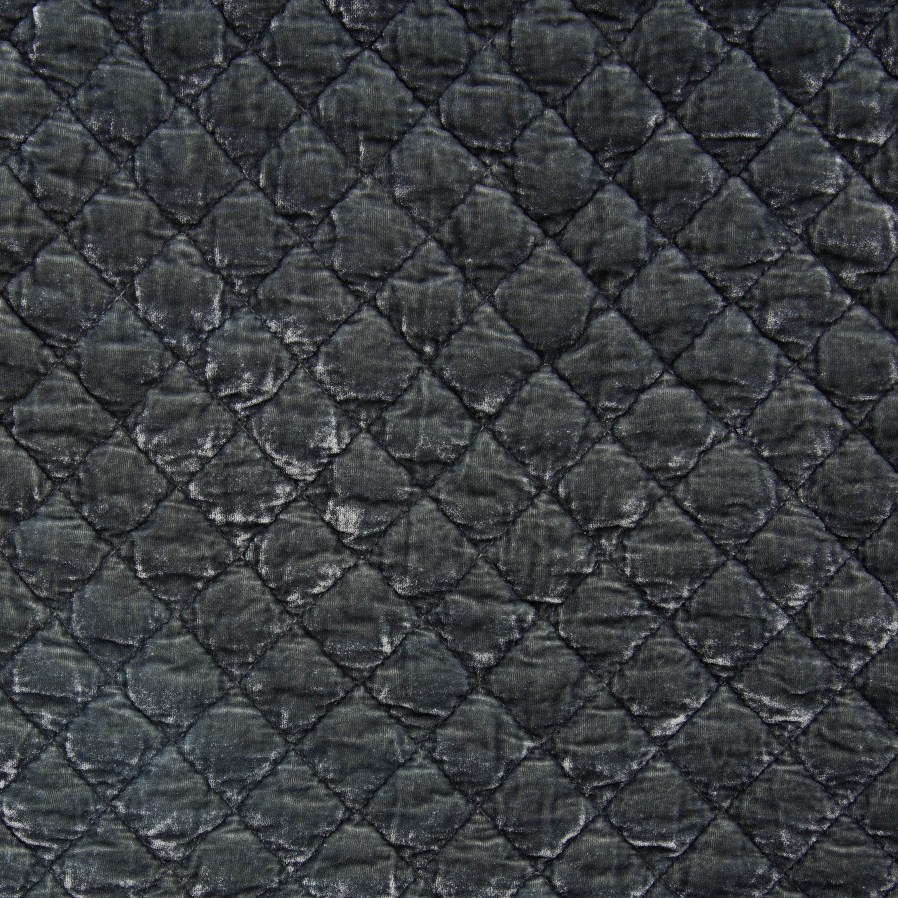 Fog: Close-up of quilted silk velvet in fog, a neutral-warm, soft mid-tone grey. 