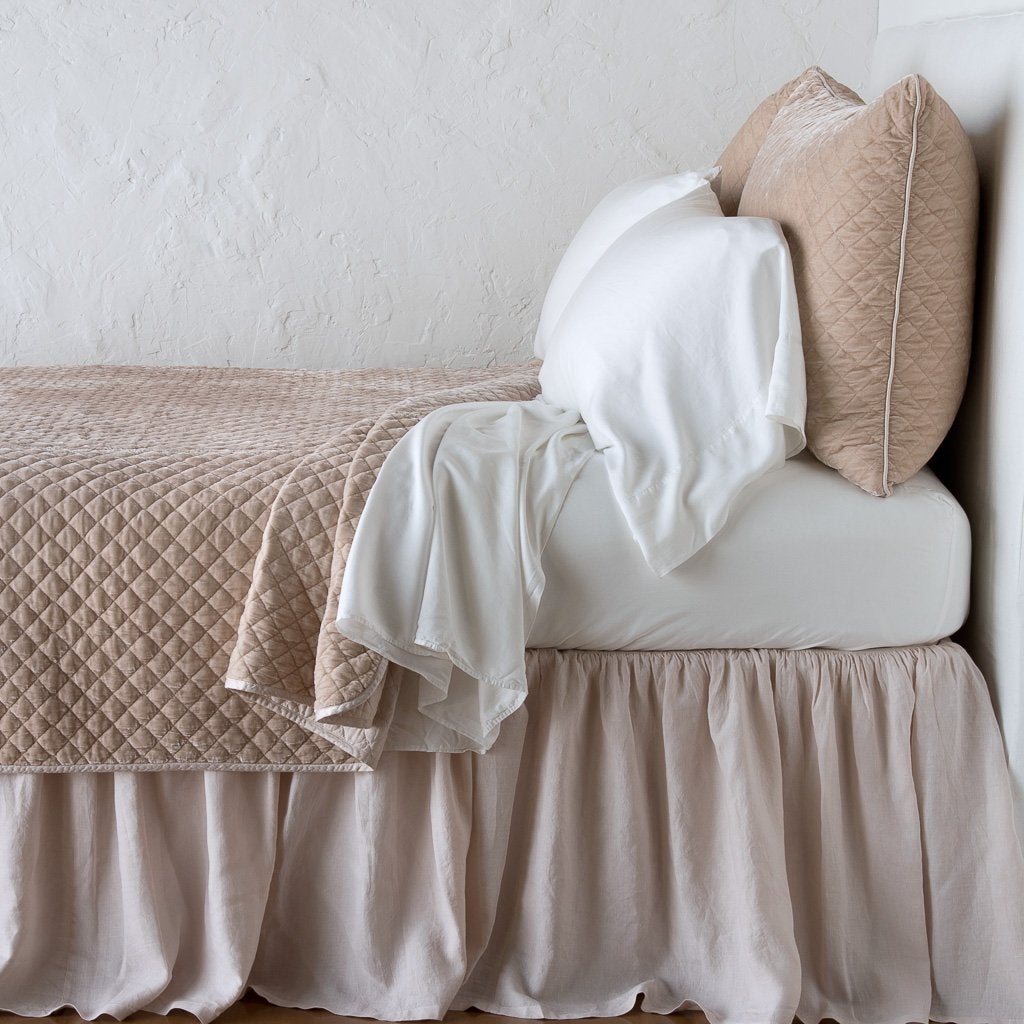Pearl: shams with matching coverlet and white sheeting - side view.