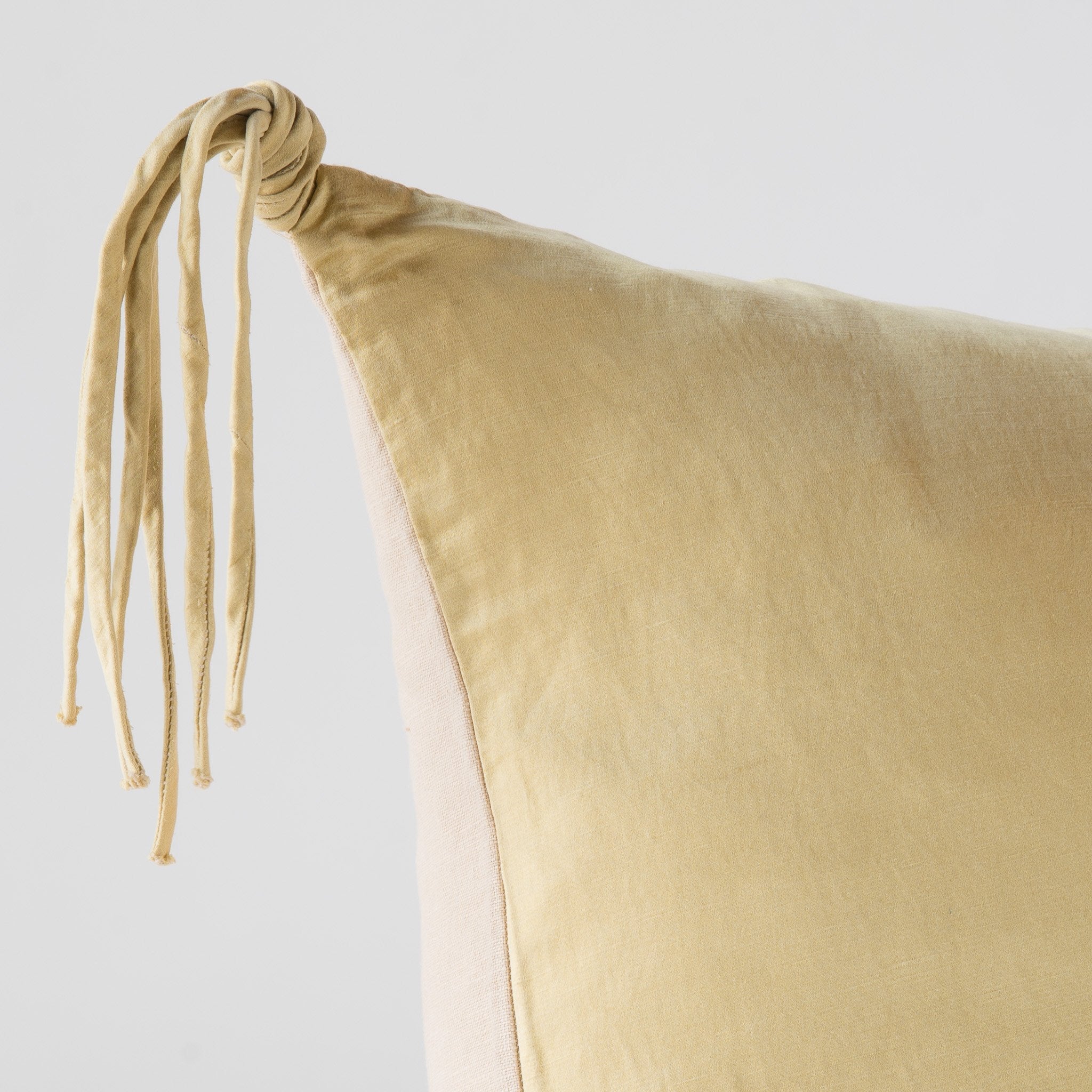 Honeycomb: Corner detail close-up, highlighting hand-tied charmeuse tassel.