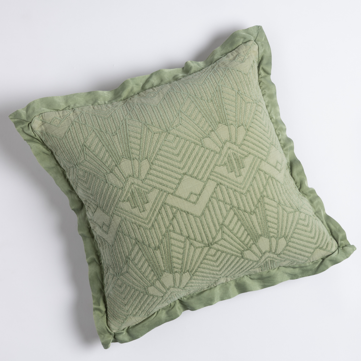 Desert Sage: shot from overhead, a throw pillow in desert sage, a serenely elegant green, offering a hushed hue, shown against a plain background.