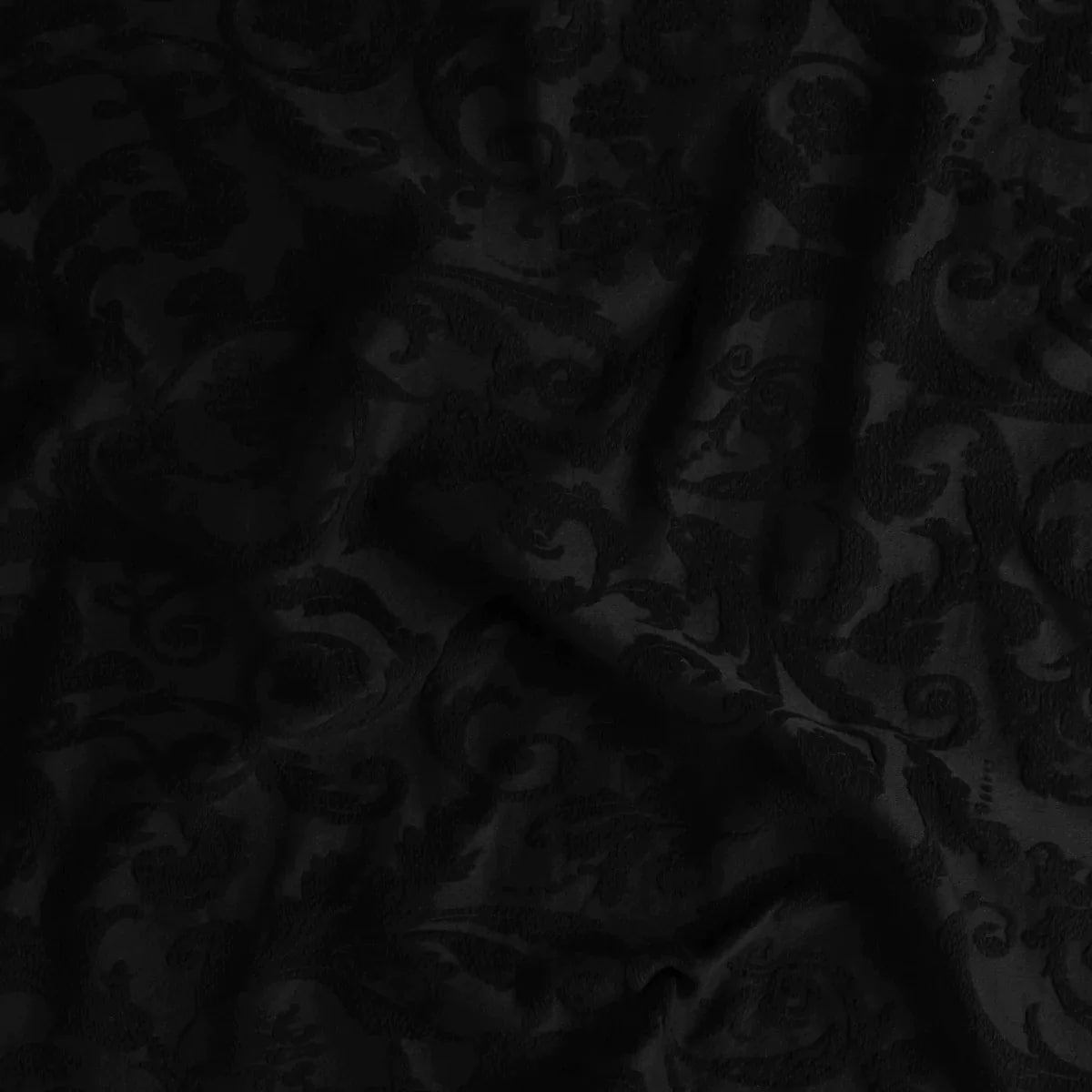 Corvino: A close up of adele fabric in corvino, a black tone. 