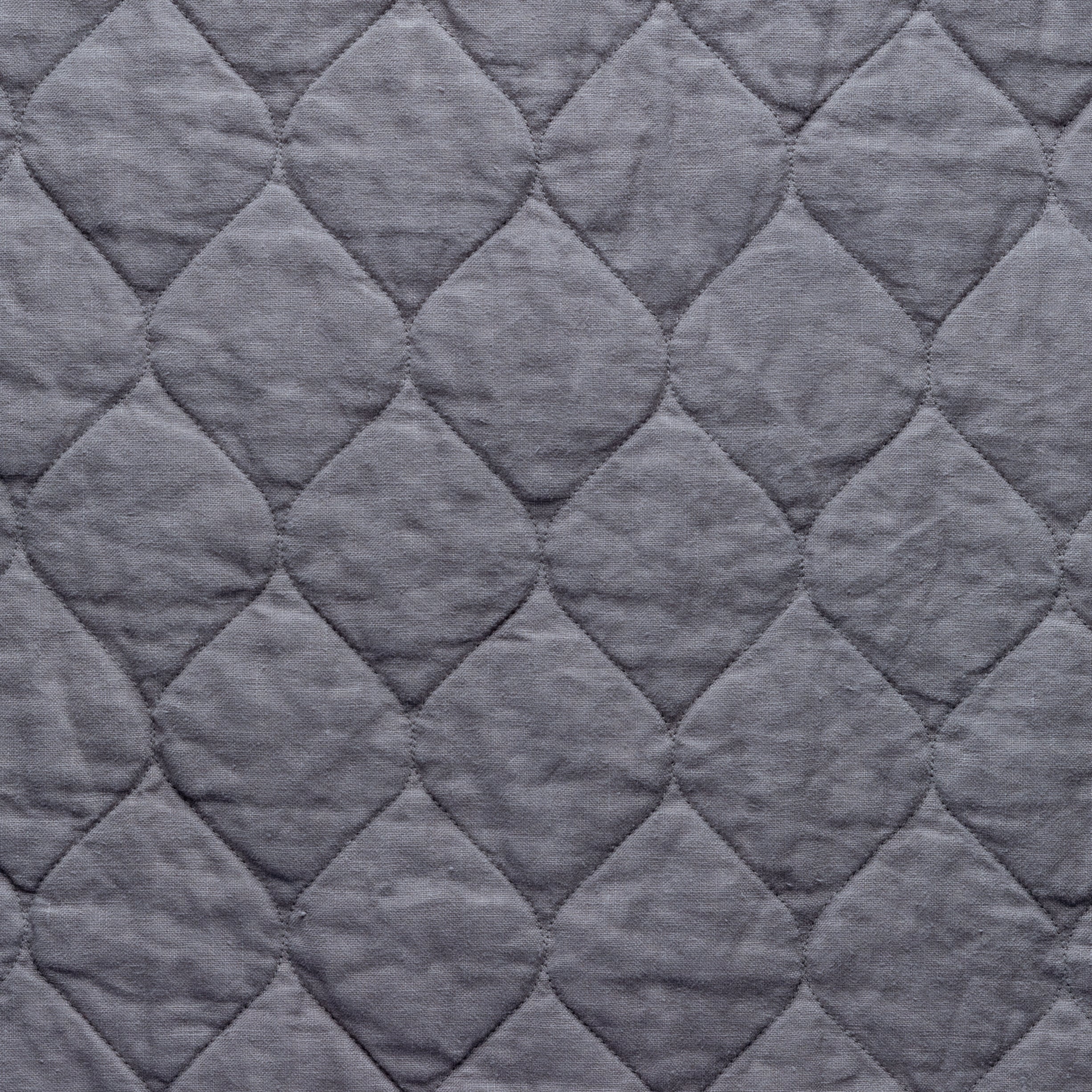 Moonlight: Close-up of Harlow cotton velvet quilting in mahogany, a deep, earthen, reddish brown. 