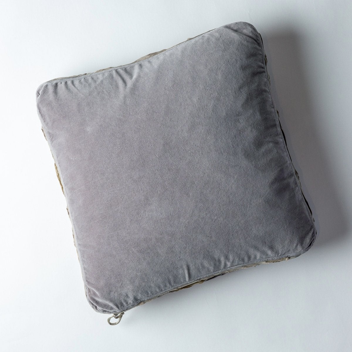 Moonlight: Cotton velvet 24 by 24 pillow on a plain background - overhead view.